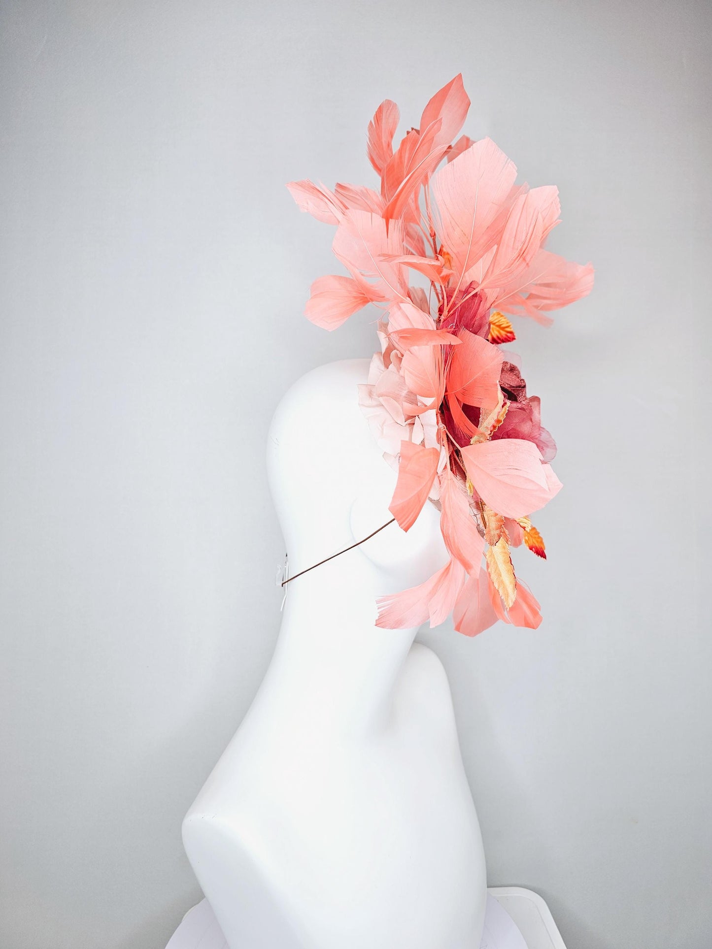 kentucky derby hat fascinator light pink satin w/ netting, dusty pink organza flower,yellow and pink leaves, peach orange branching feathers