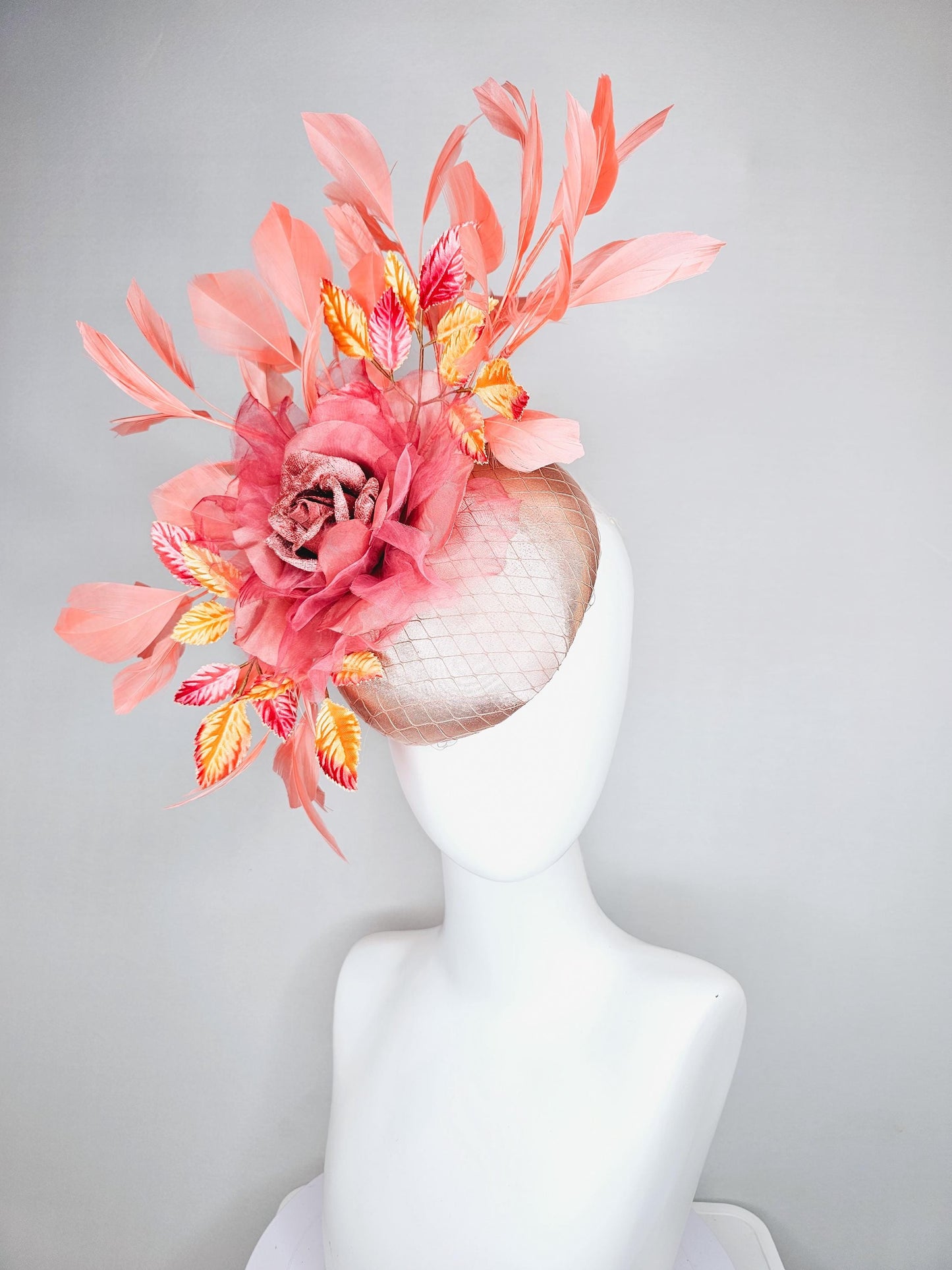 kentucky derby hat fascinator light pink satin w/ netting, dusty pink organza flower,yellow and pink leaves, peach orange branching feathers