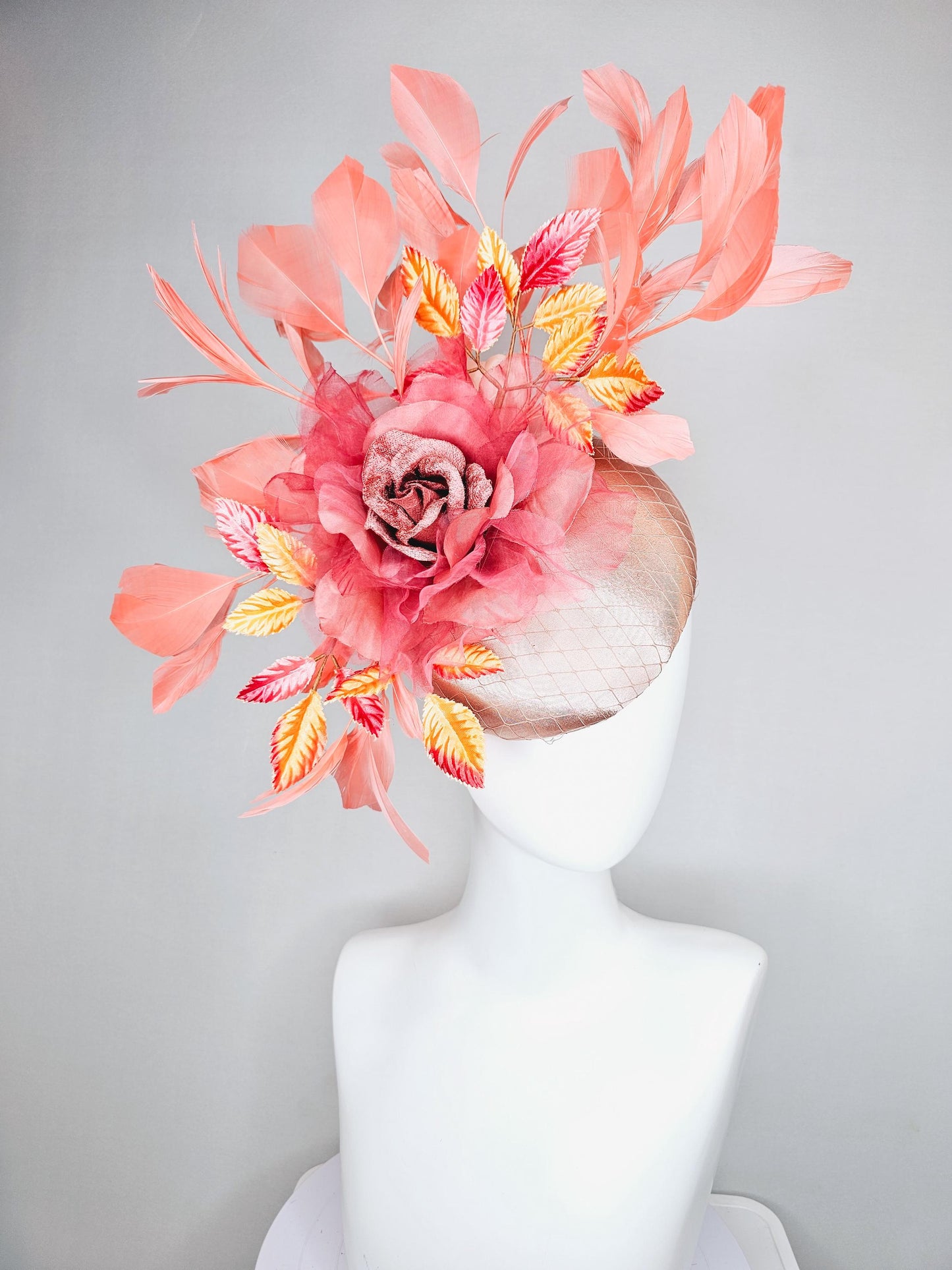 kentucky derby hat fascinator light pink satin w/ netting, dusty pink organza flower,yellow and pink leaves, peach orange branching feathers