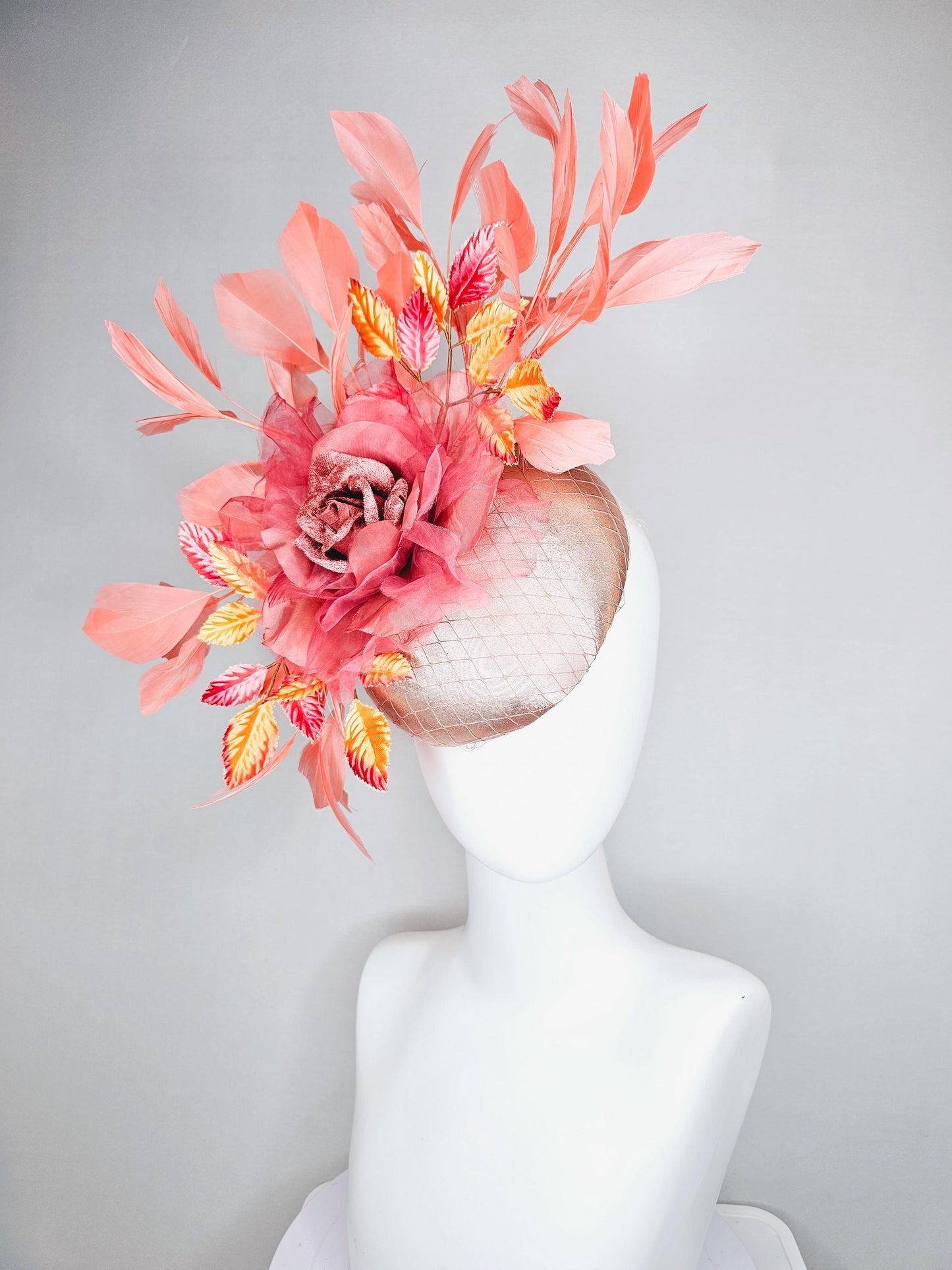 kentucky derby hat fascinator light pink satin w/ netting, dusty pink organza flower,yellow and pink leaves, peach orange branching feathers