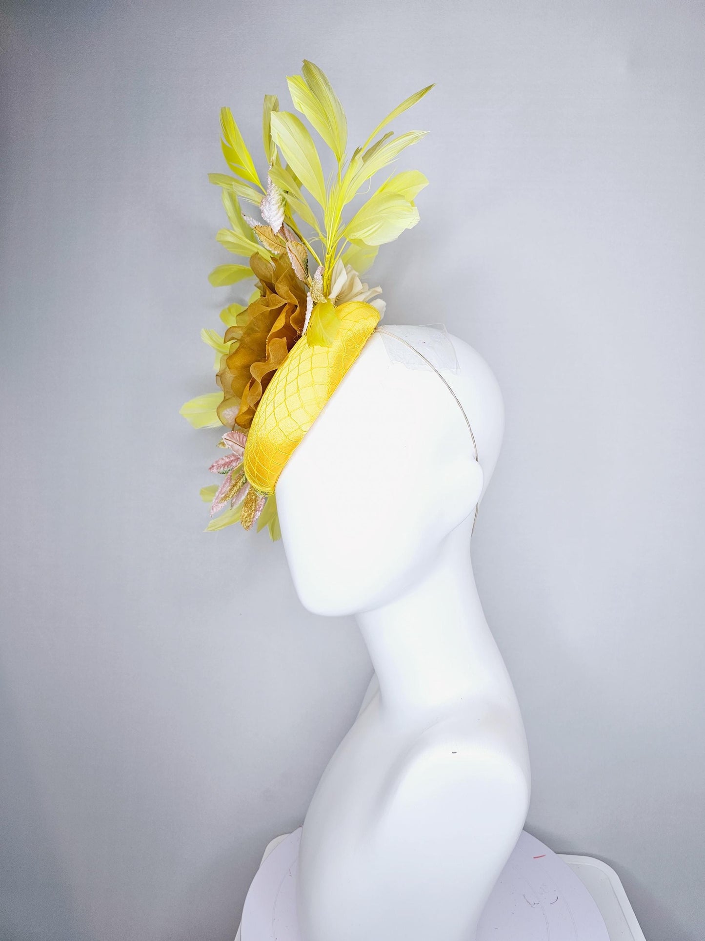 kentucky derby hat fascinator yellow satin with netting, mustard yellow organza flower, light pink yellow leaves, yellow branching feathers