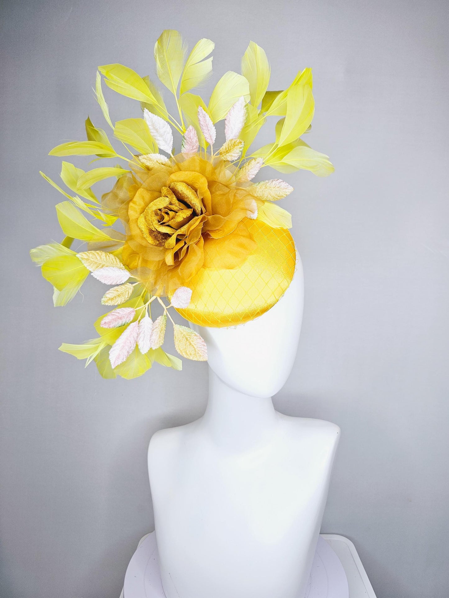 kentucky derby hat fascinator yellow satin with netting, mustard yellow organza flower, light pink yellow leaves, yellow branching feathers