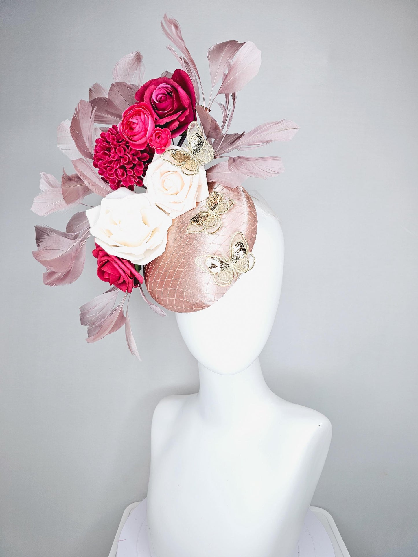 kentucky derby hat fascinator light pink satin with netting, white cherry red satin flowers,taupe branching feathers,gold sequin butterflies