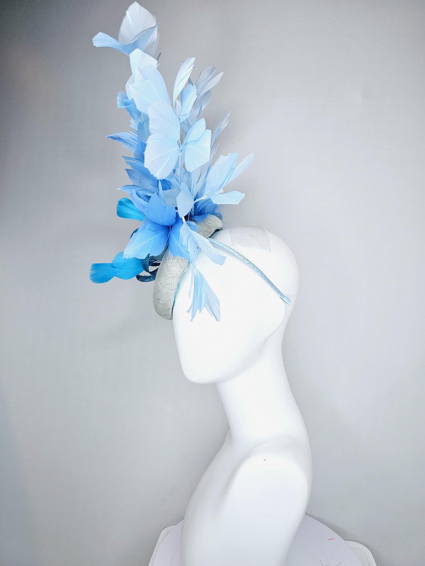 kentucky derby hat fascinator light baby blue sinamay base with blue sinamay bow, sky blue baby blue light blue branching feathers