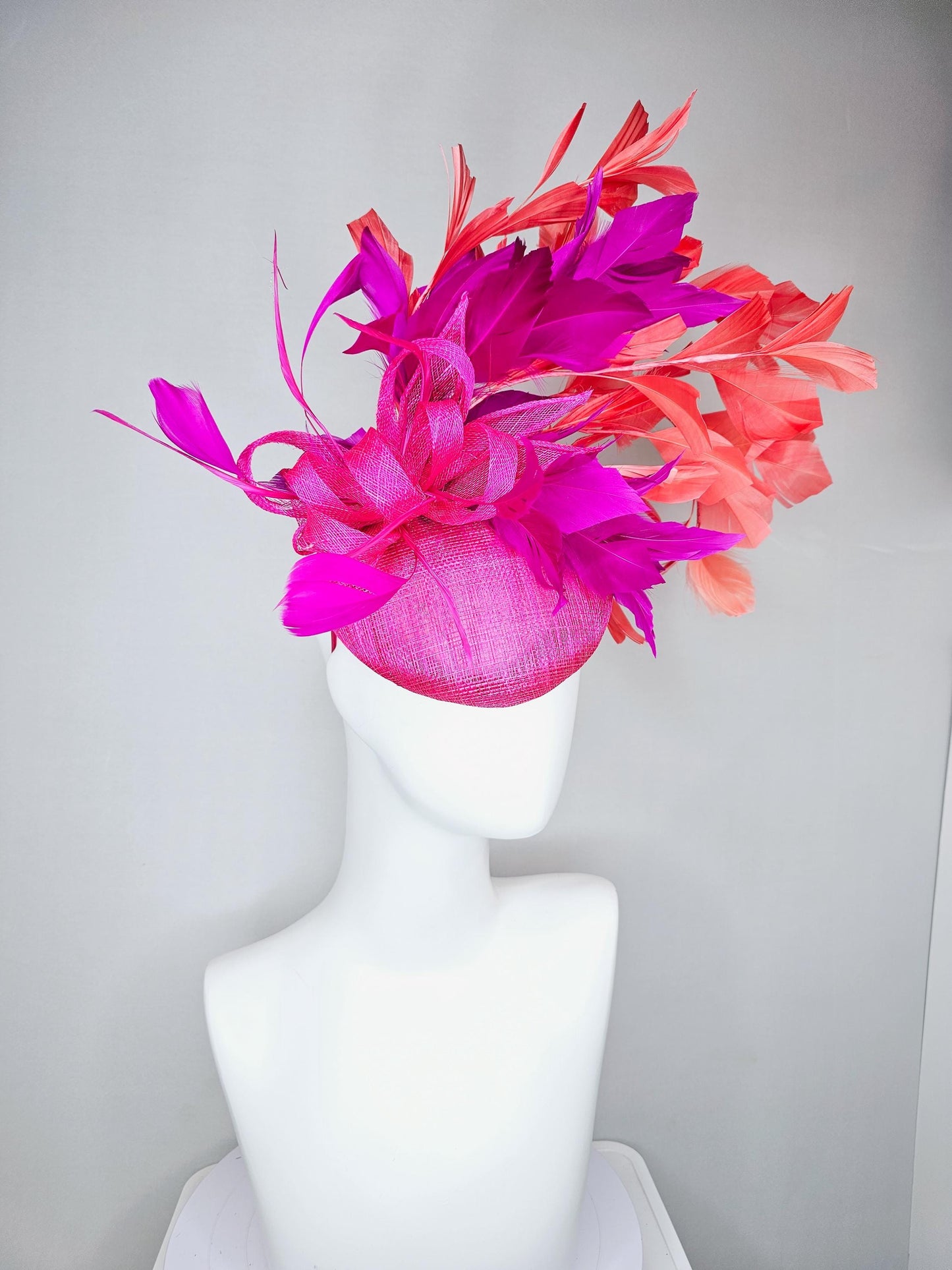 kentucky derby hat fascinator hot bright pink sinamay base with bright pink sinamay bow flower, pink fuchsia coral orange branching feathers