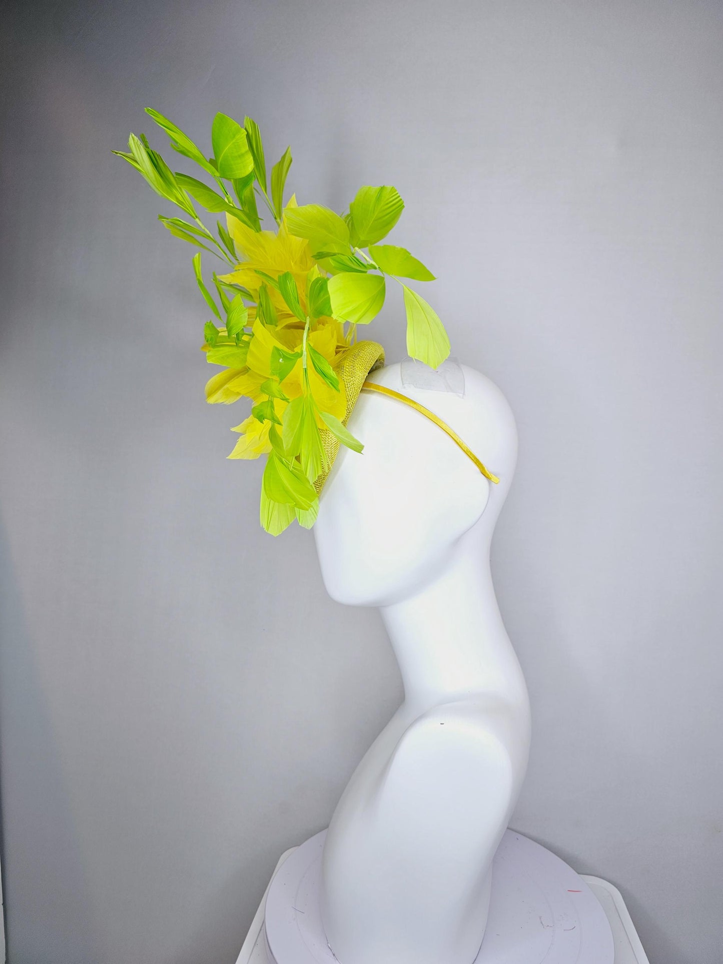 kentucky derby hat fascinator yellow sinamay base with yellow sinamay bow, yellow and yellow lime green branching feathers