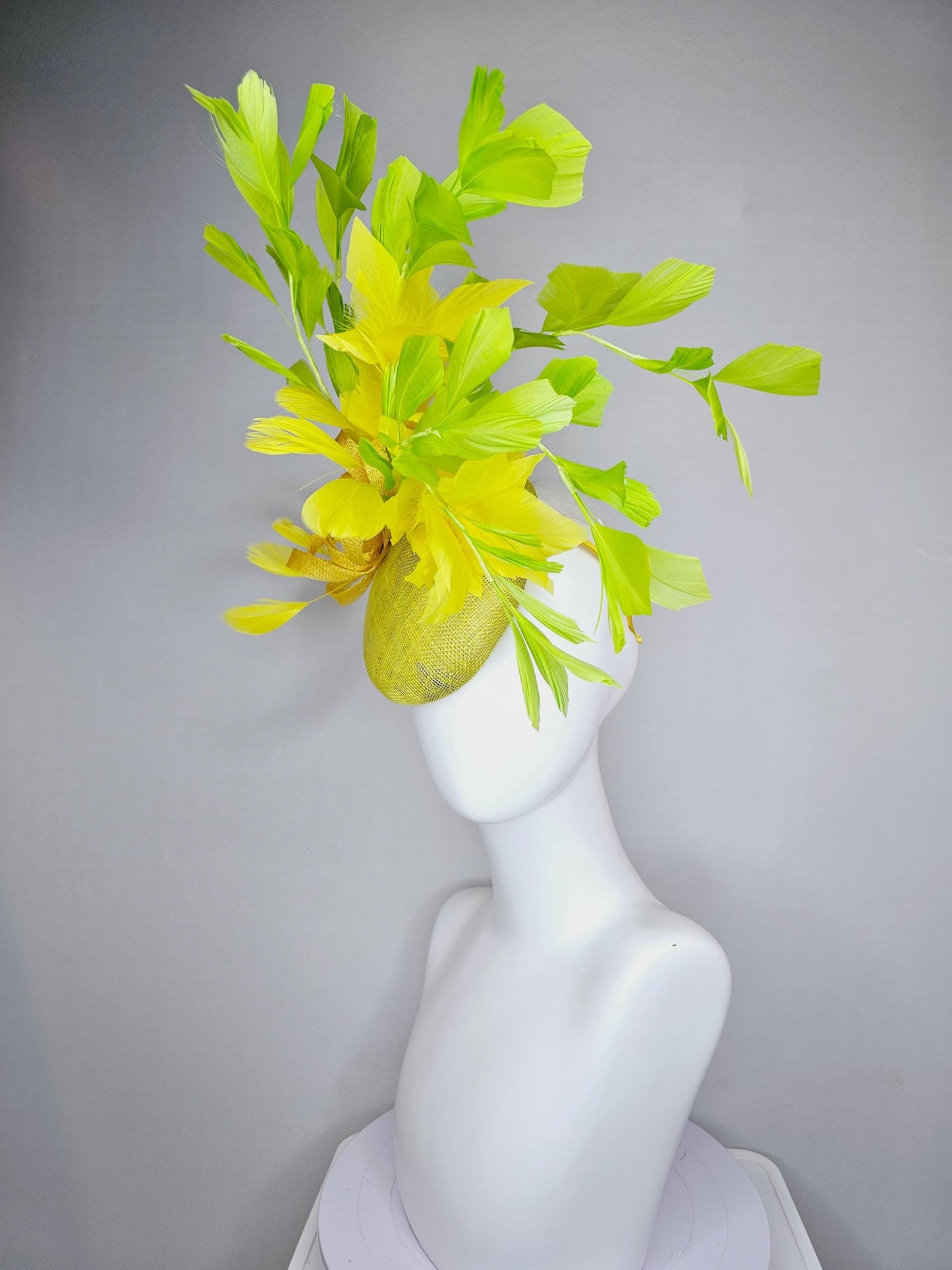 kentucky derby hat fascinator yellow sinamay base with yellow sinamay bow, yellow and yellow lime green branching feathers