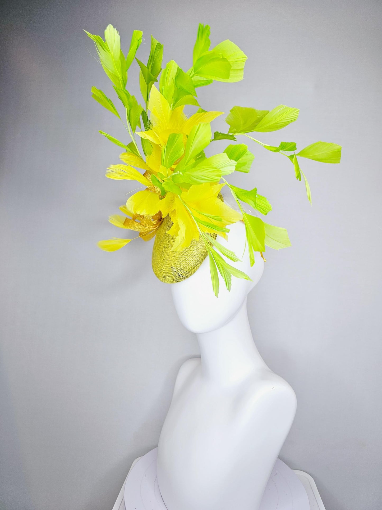 kentucky derby hat fascinator yellow sinamay base with yellow sinamay bow, yellow and yellow lime green branching feathers