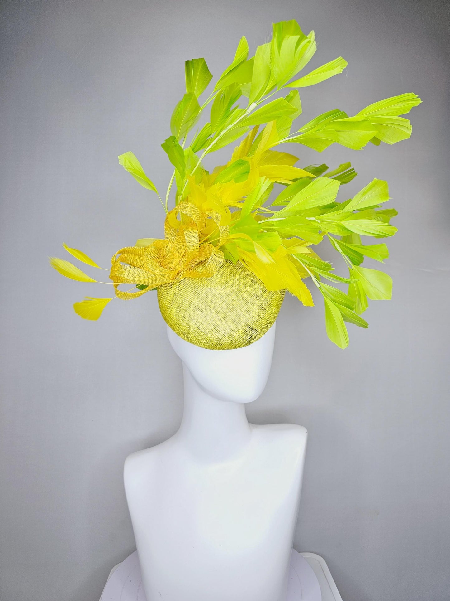 kentucky derby hat fascinator yellow sinamay base with yellow sinamay bow, yellow and yellow lime green branching feathers