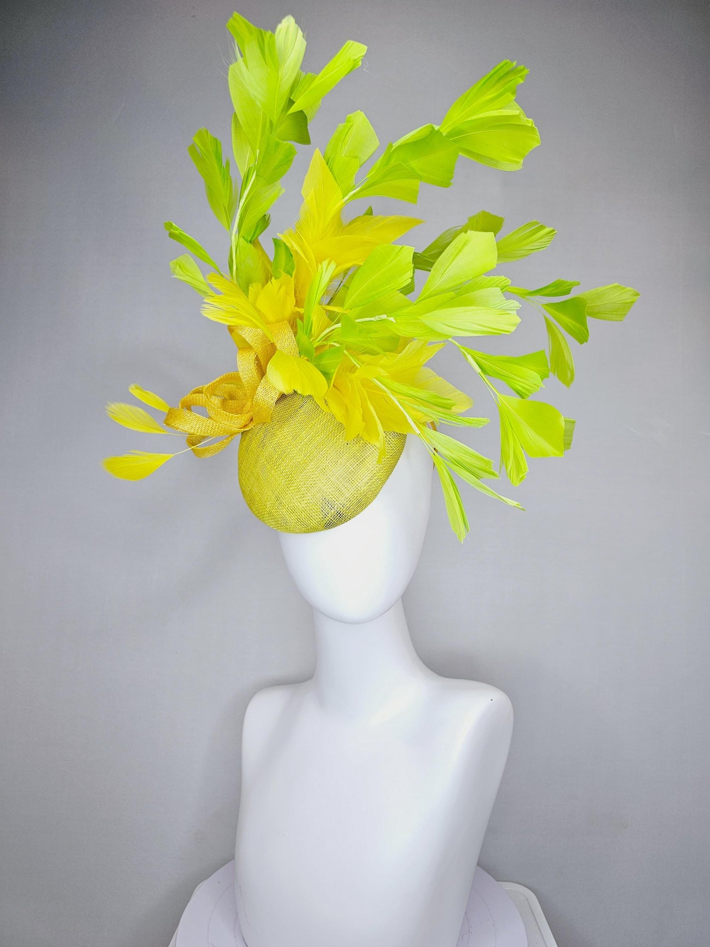 kentucky derby hat fascinator yellow sinamay base with yellow sinamay bow, yellow and yellow lime green branching feathers