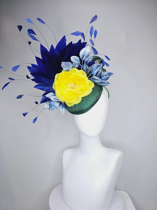kentucky derby hat fascinator dark green sinamay with midnight navy blue feathers,ombre light blue leaves and large yellow satin rose flower