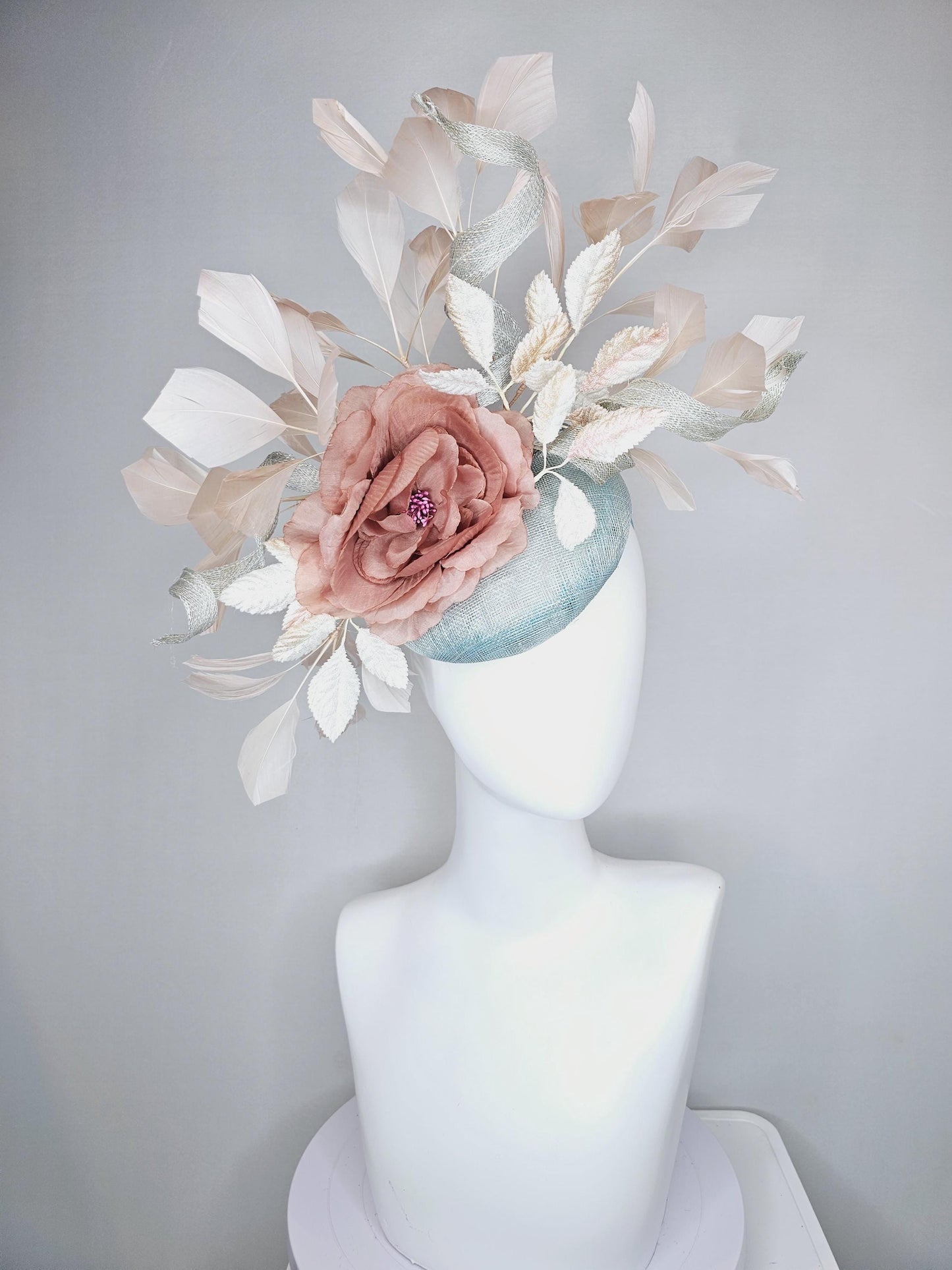 kentucky derby hat fascinator light blue sinamay with light beige branching feathers,cream velvet leaves, dusty pink rose silk satin flower