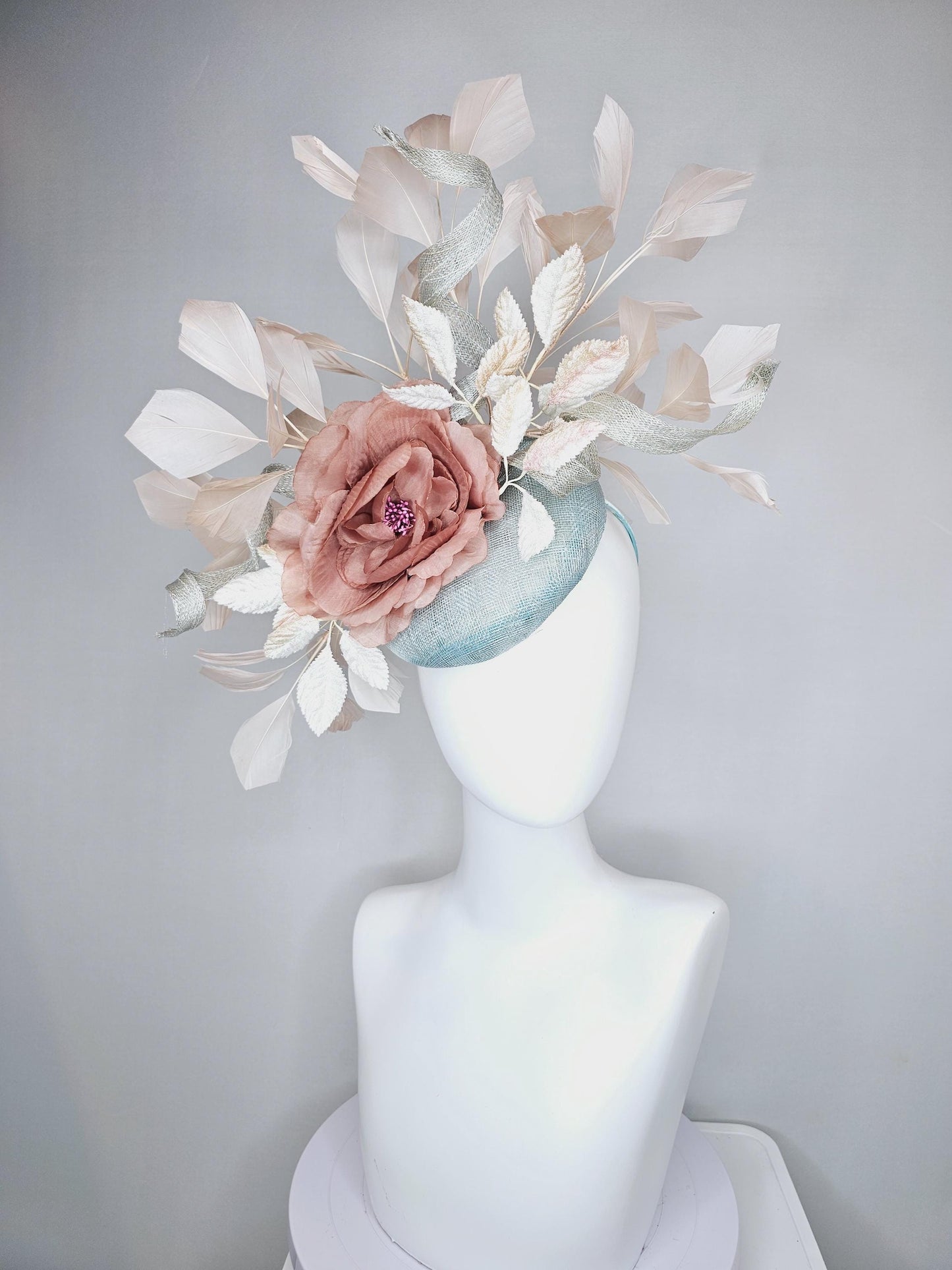 kentucky derby hat fascinator light blue sinamay with light beige branching feathers,cream velvet leaves, dusty pink rose silk satin flower