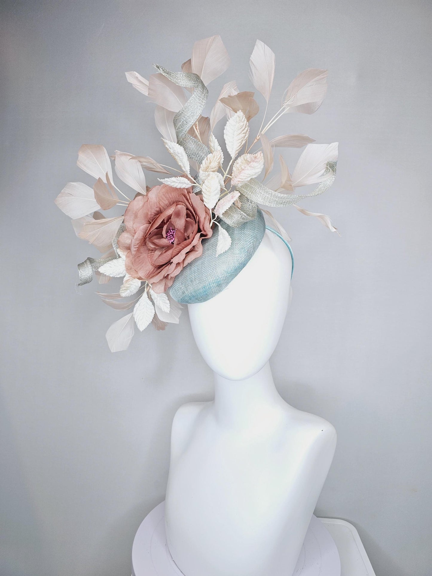 kentucky derby hat fascinator light blue sinamay with light beige branching feathers,cream velvet leaves, dusty pink rose silk satin flower