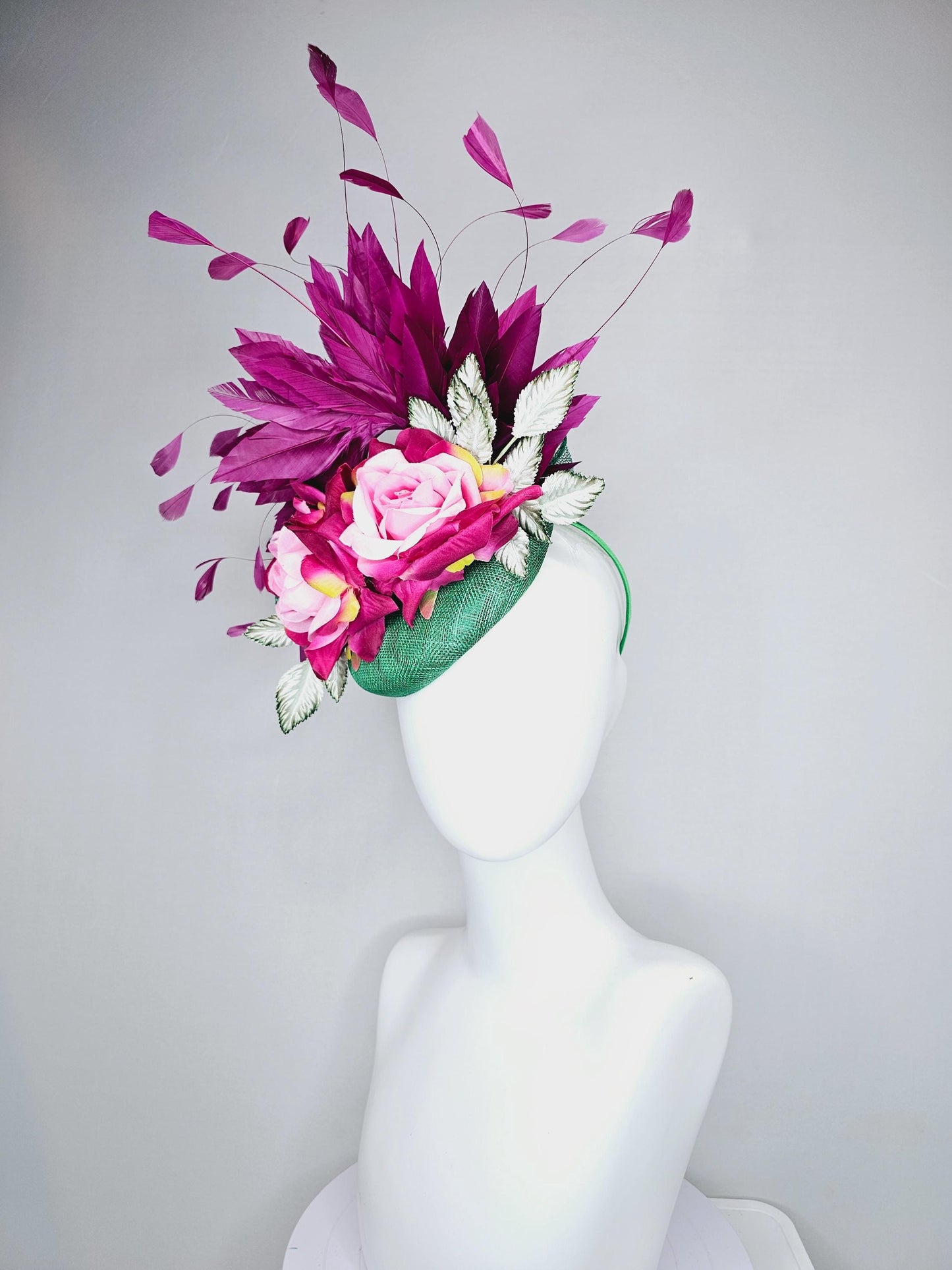 kentucky derby hat fascinator green sinamay with magenta purple branching feathers,light green ombre leaves,pink yellow fuchsia satin roses