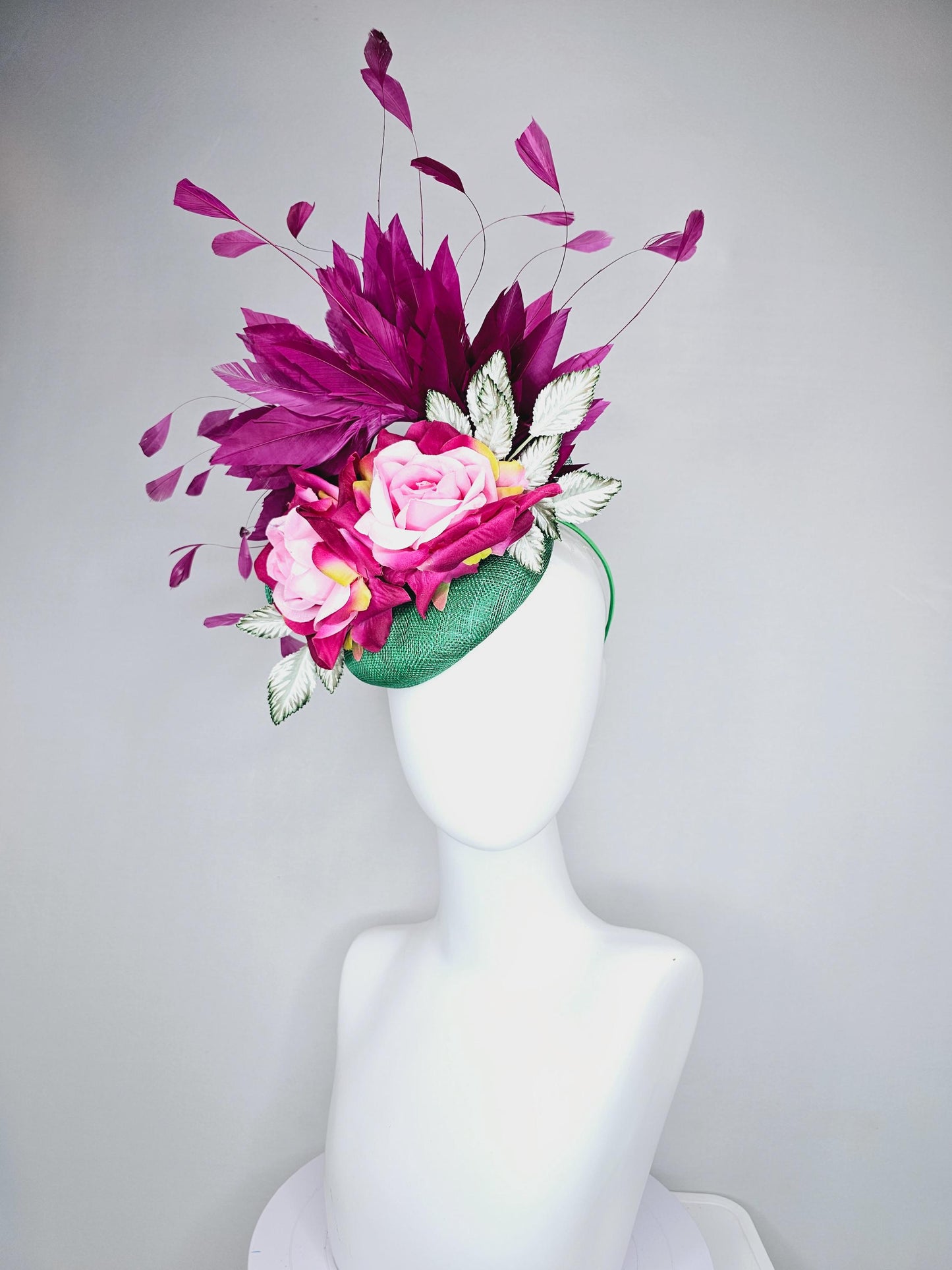 kentucky derby hat fascinator green sinamay with magenta purple branching feathers,light green ombre leaves,pink yellow fuchsia satin roses