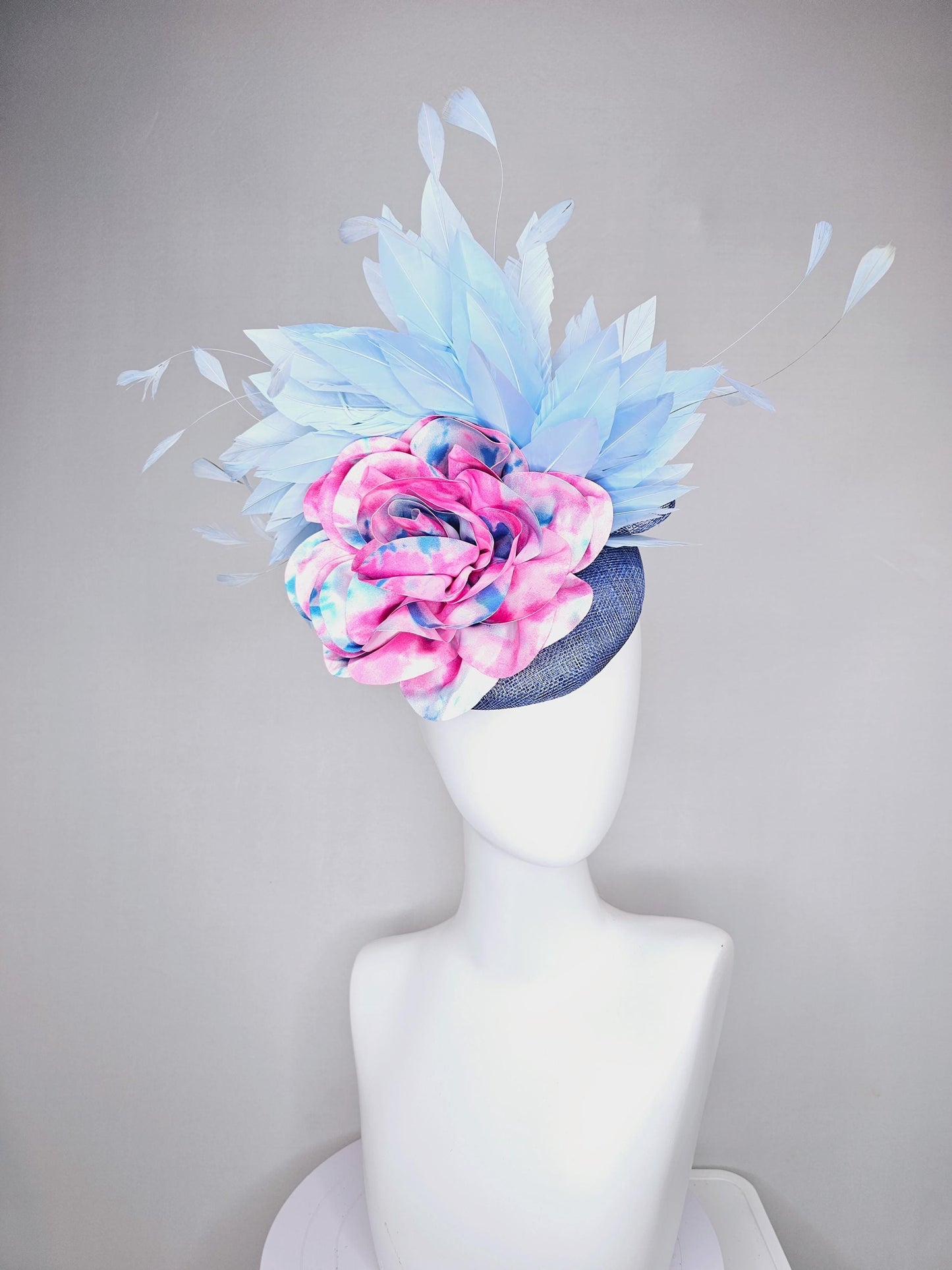 kentucky derby hat fascinator blue sinamay with light blue branching feathers and large pink and blue tie dye satin rose flower