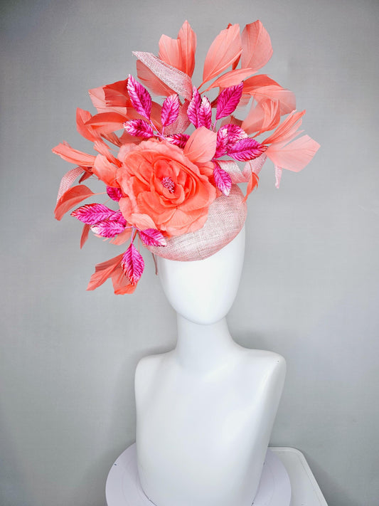 kentucky derby hat fascinator light pink sinamay w/ coral orange peach satin rose flower, bright pink leaves,coral orange branching feathers