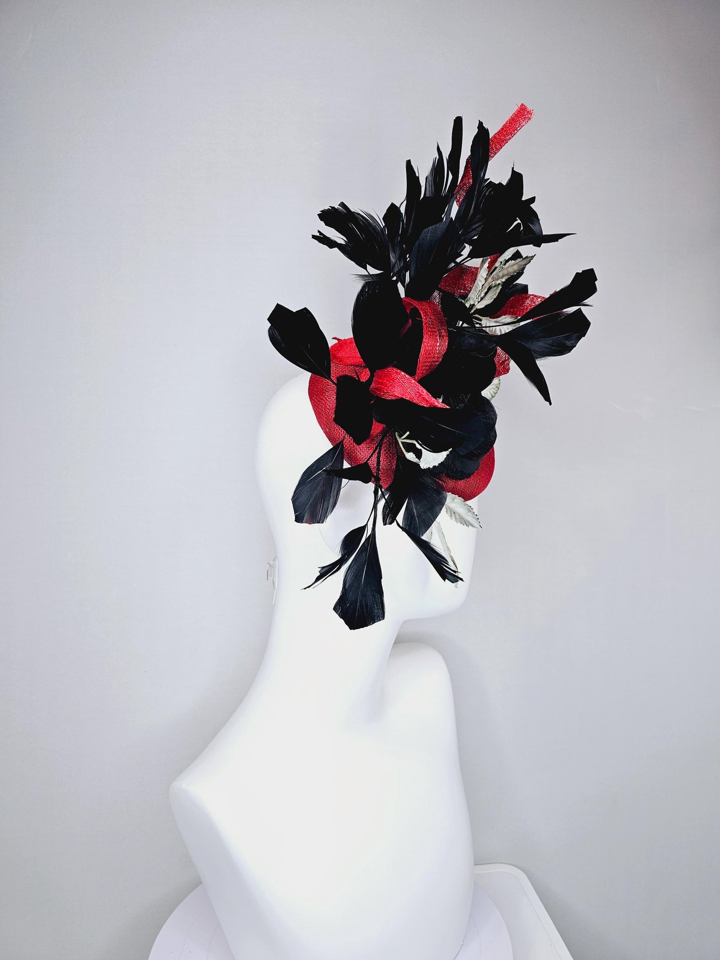 kentucky derby hat fascinator red sinamay base with red sinamay curls, black satin rose flower, ombre green leaves, black branching feathers