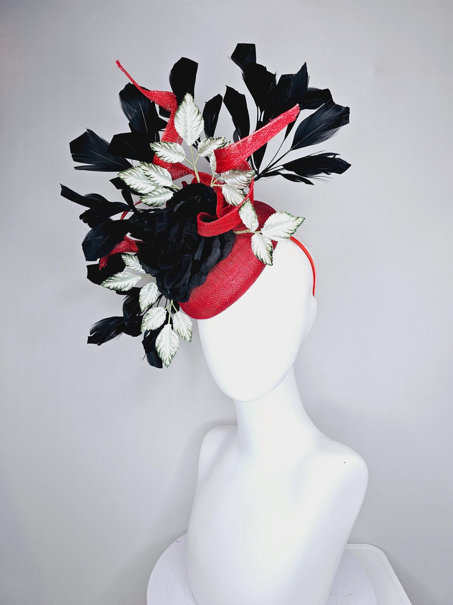 kentucky derby hat fascinator red sinamay base with red sinamay curls, black satin rose flower, ombre green leaves, black branching feathers