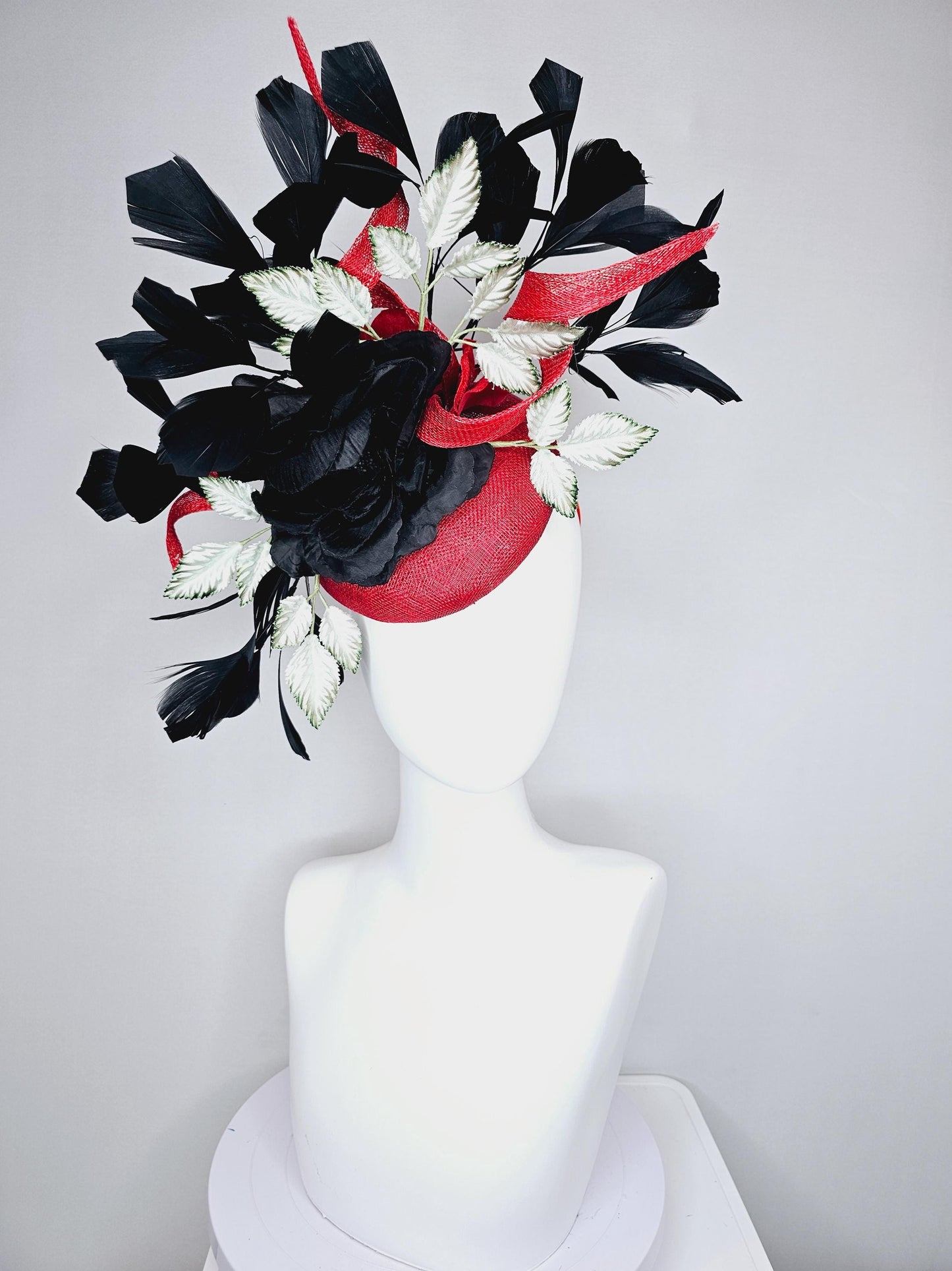 kentucky derby hat fascinator red sinamay base with red sinamay curls, black satin rose flower, ombre green leaves, black branching feathers