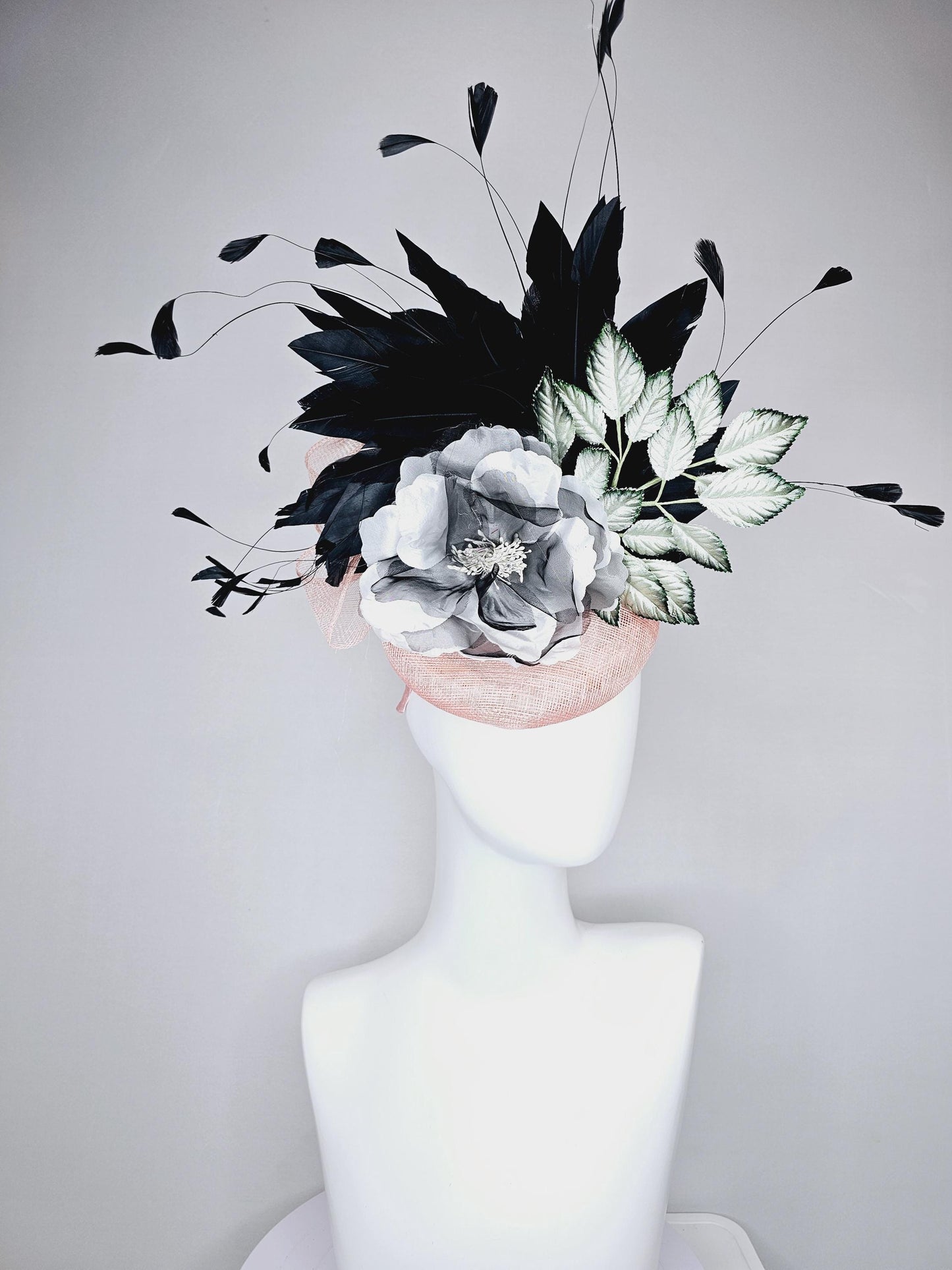 kentucky derby hat fascinator light pink sinamay with black and white organza flower, ombre black green leaves, black branching feathers