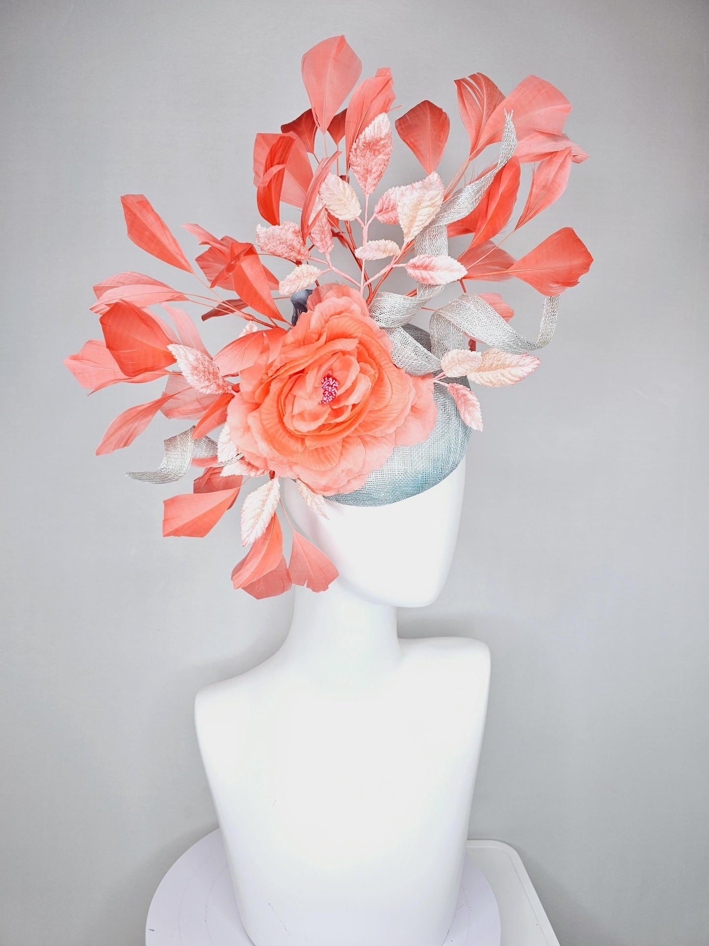 kentucky derby hat fascinator light blue sinamay w/ sinamay curls, coral peach orange satin flower, ombre peach leaves,coral orange feathers