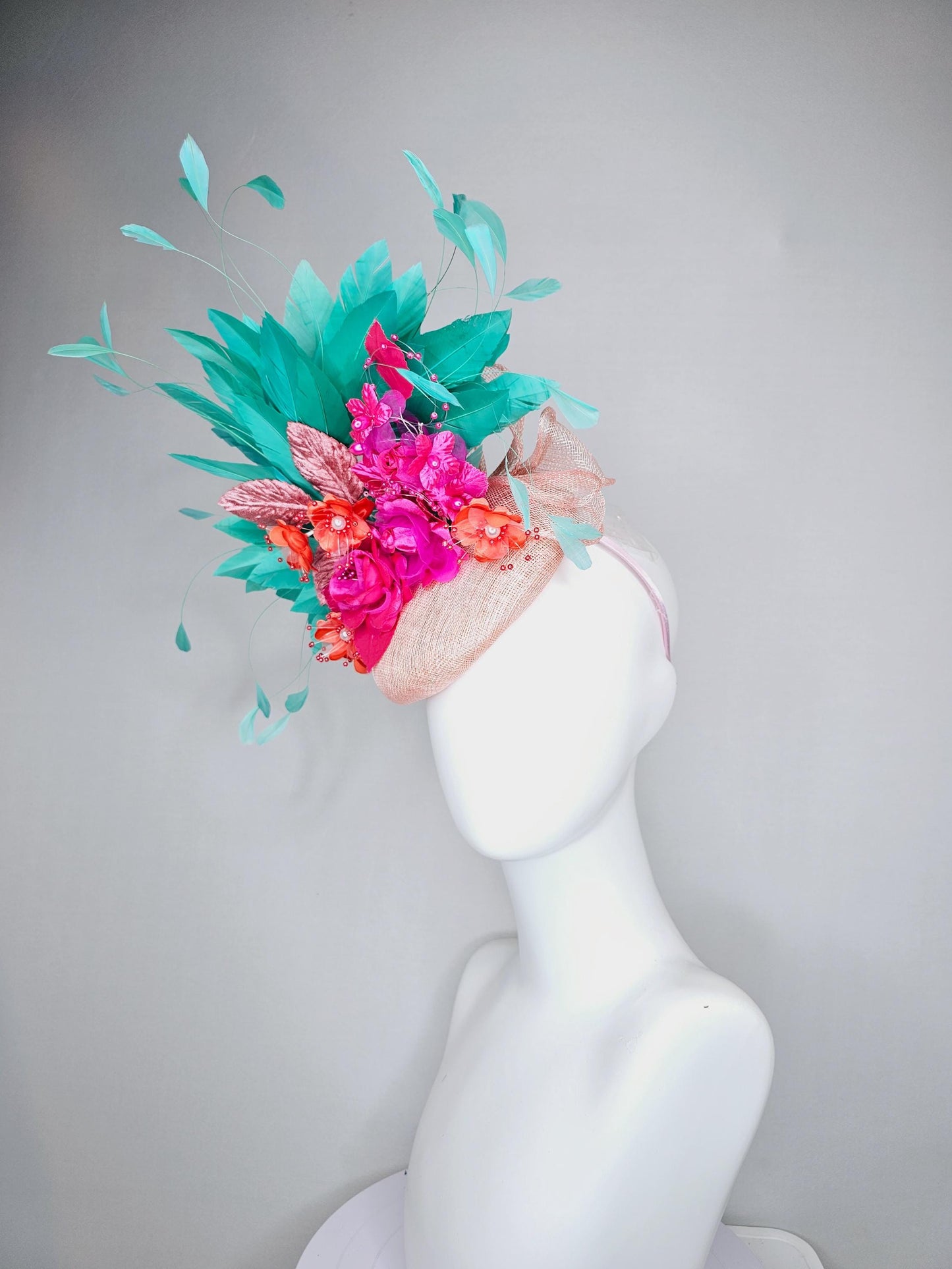 kentucky derby hat fascinator light pink sinamay with mint green branching feathers,bright pink coral orange satin flowers,blush pink leaves