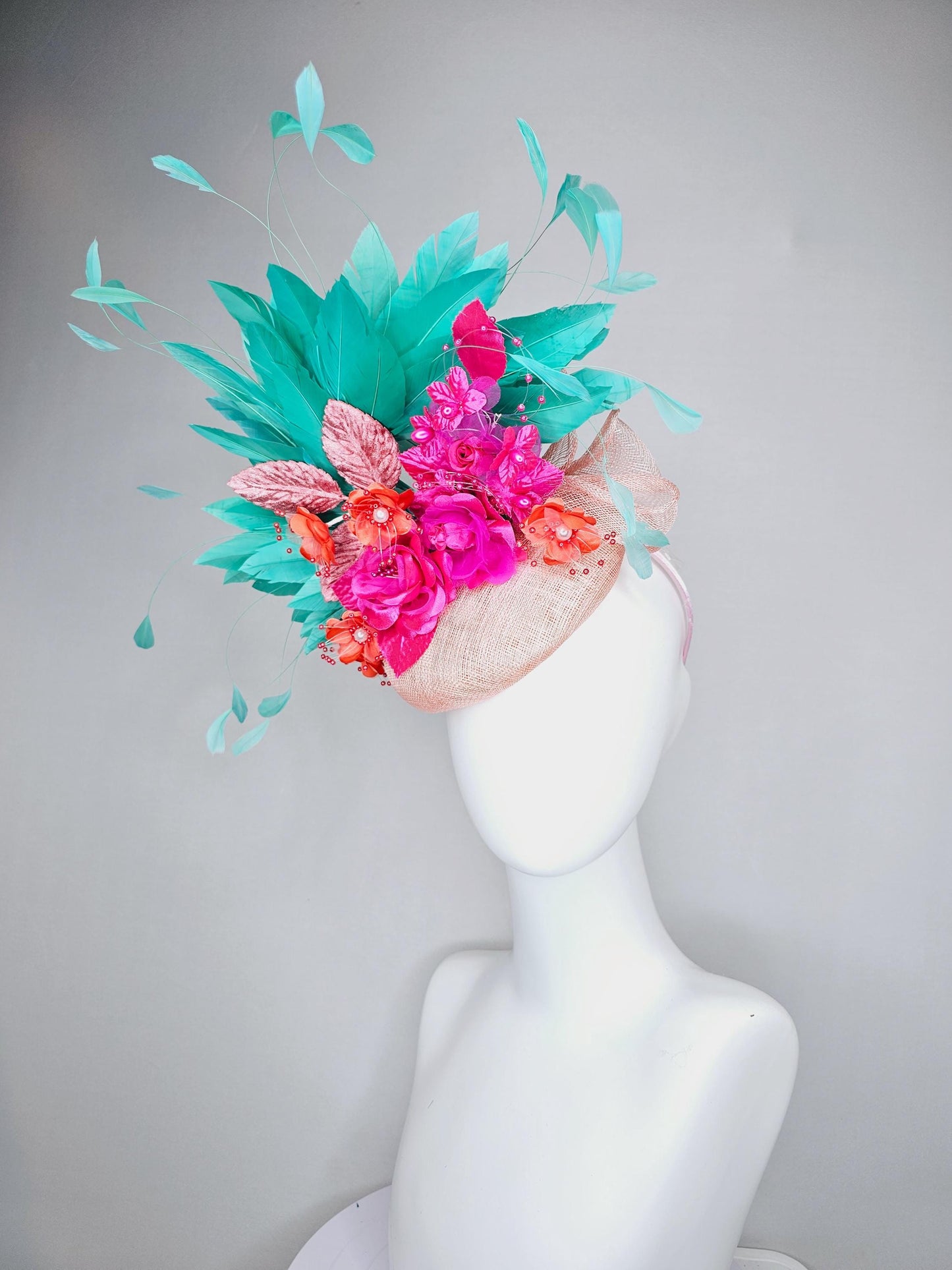 kentucky derby hat fascinator light pink sinamay with mint green branching feathers,bright pink coral orange satin flowers,blush pink leaves