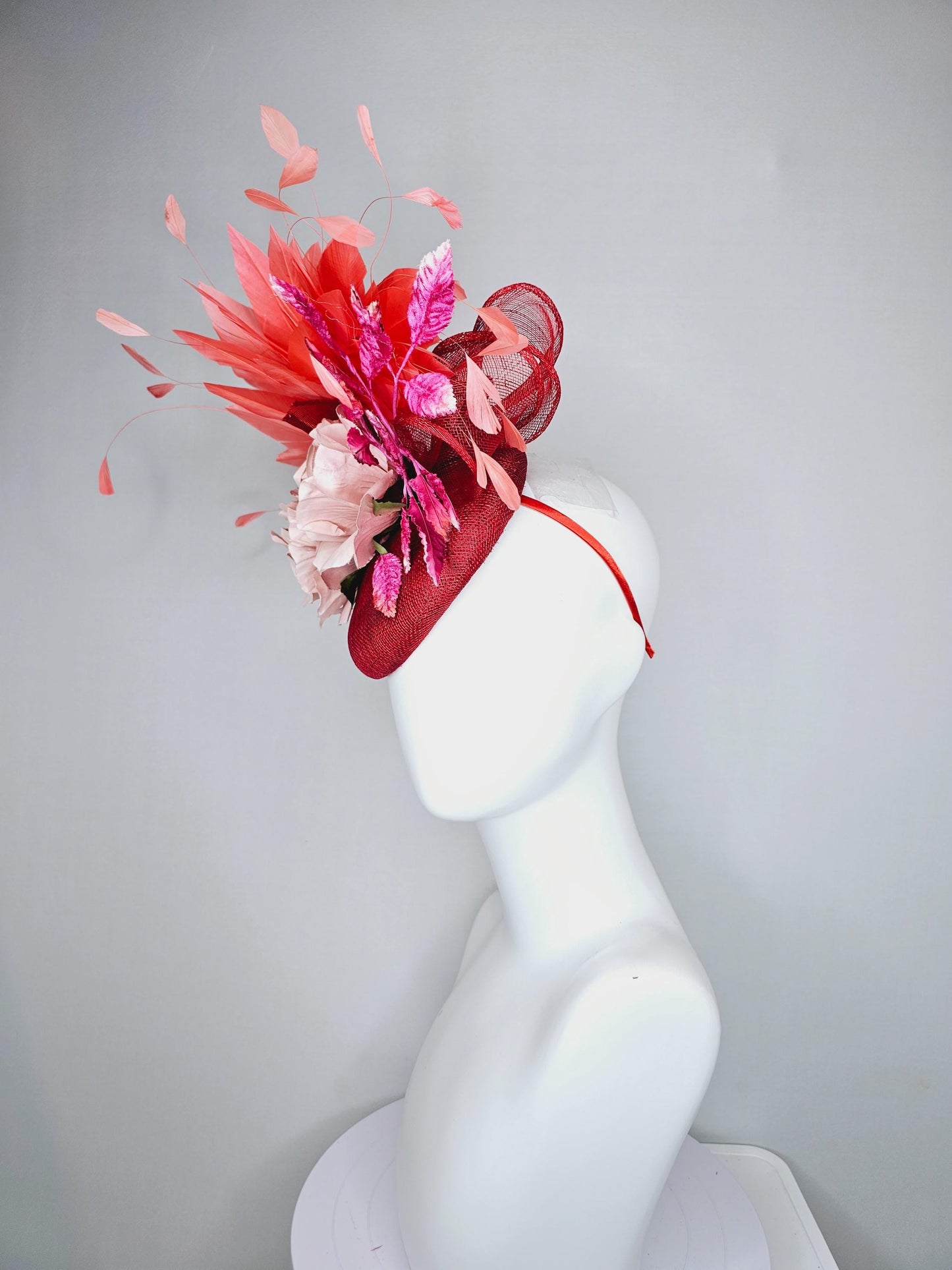 kentucky derby hat fascinator red sinamay with curls,coral orange branching feathers, pink velvet leaves,light rose pink satin silk flowers