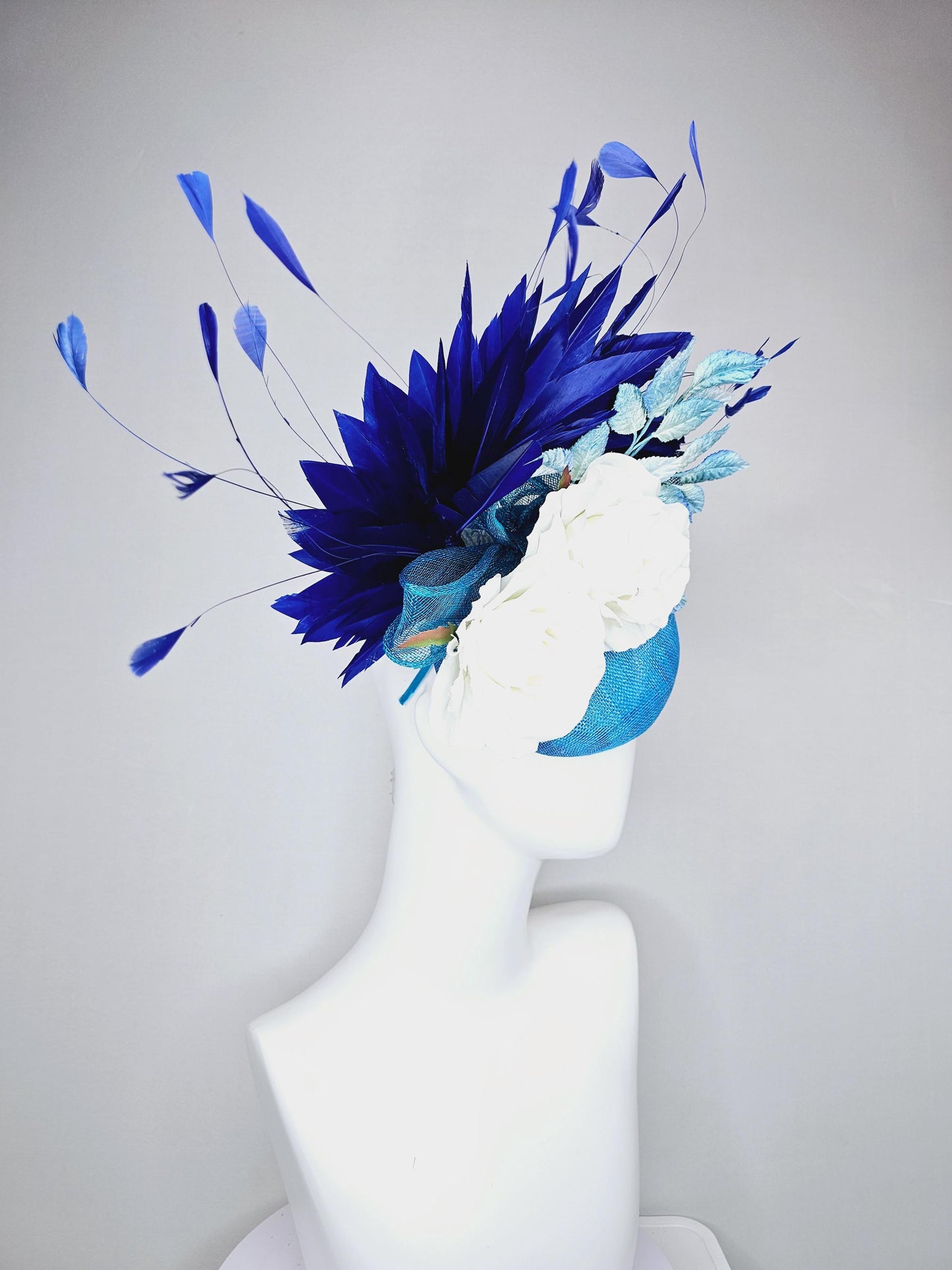 kentucky derby hat fascinator blue sinamay with midnight navy blue branching feathers,light blue ombre leaves,white satin silk rose flowers