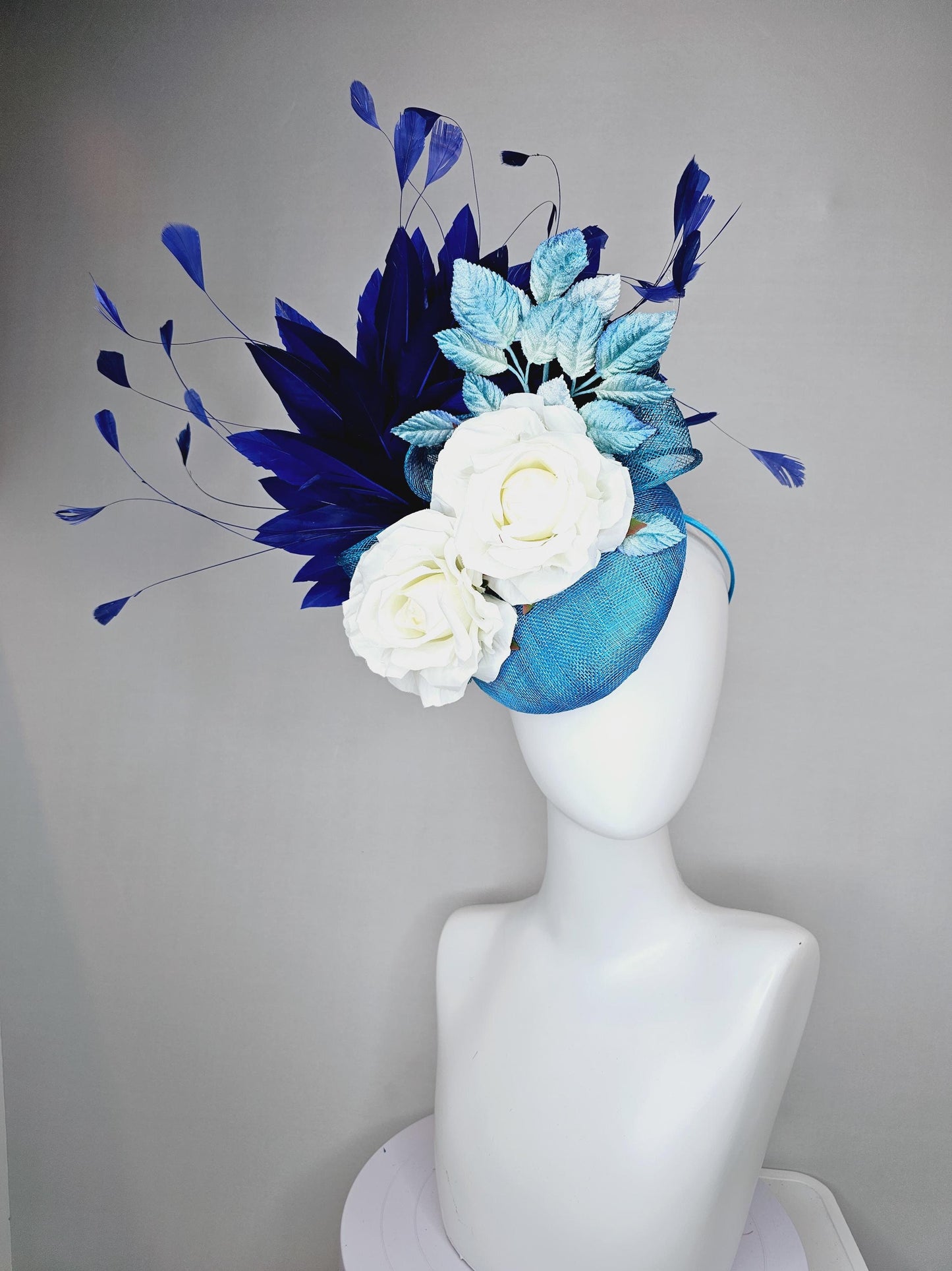 kentucky derby hat fascinator blue sinamay with midnight navy blue branching feathers,light blue ombre leaves,white satin silk rose flowers