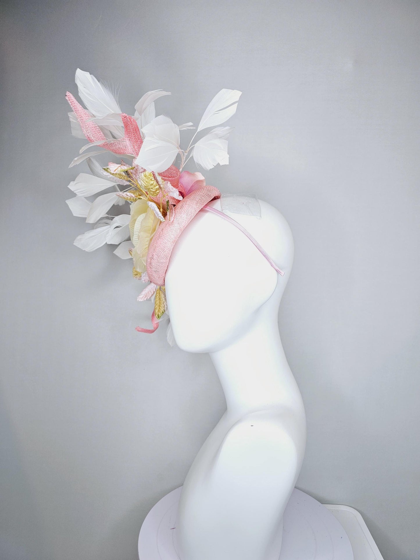 kentucky derby hat fascinator light pink sinamay with curls,white branching feathers,light pastel yellow satin silk rose,yellow pink leaves