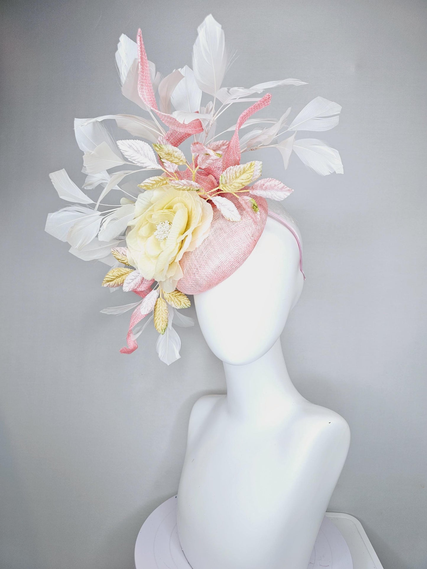 kentucky derby hat fascinator light pink sinamay with curls,white branching feathers,light pastel yellow satin silk rose,yellow pink leaves