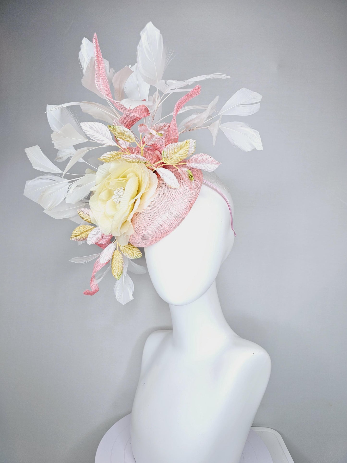 kentucky derby hat fascinator light pink sinamay with curls,white branching feathers,light pastel yellow satin silk rose,yellow pink leaves