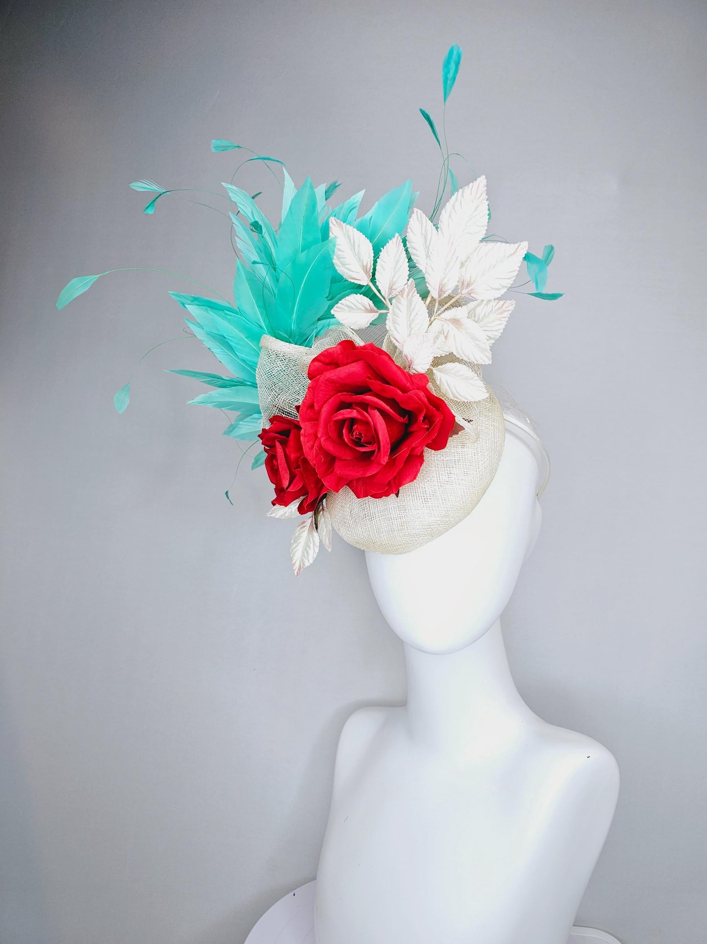 kentucky derby hat fascinator white ivory sinamay with white velvet leaves,aqua green blue branching feathers,bright red satin silk roses