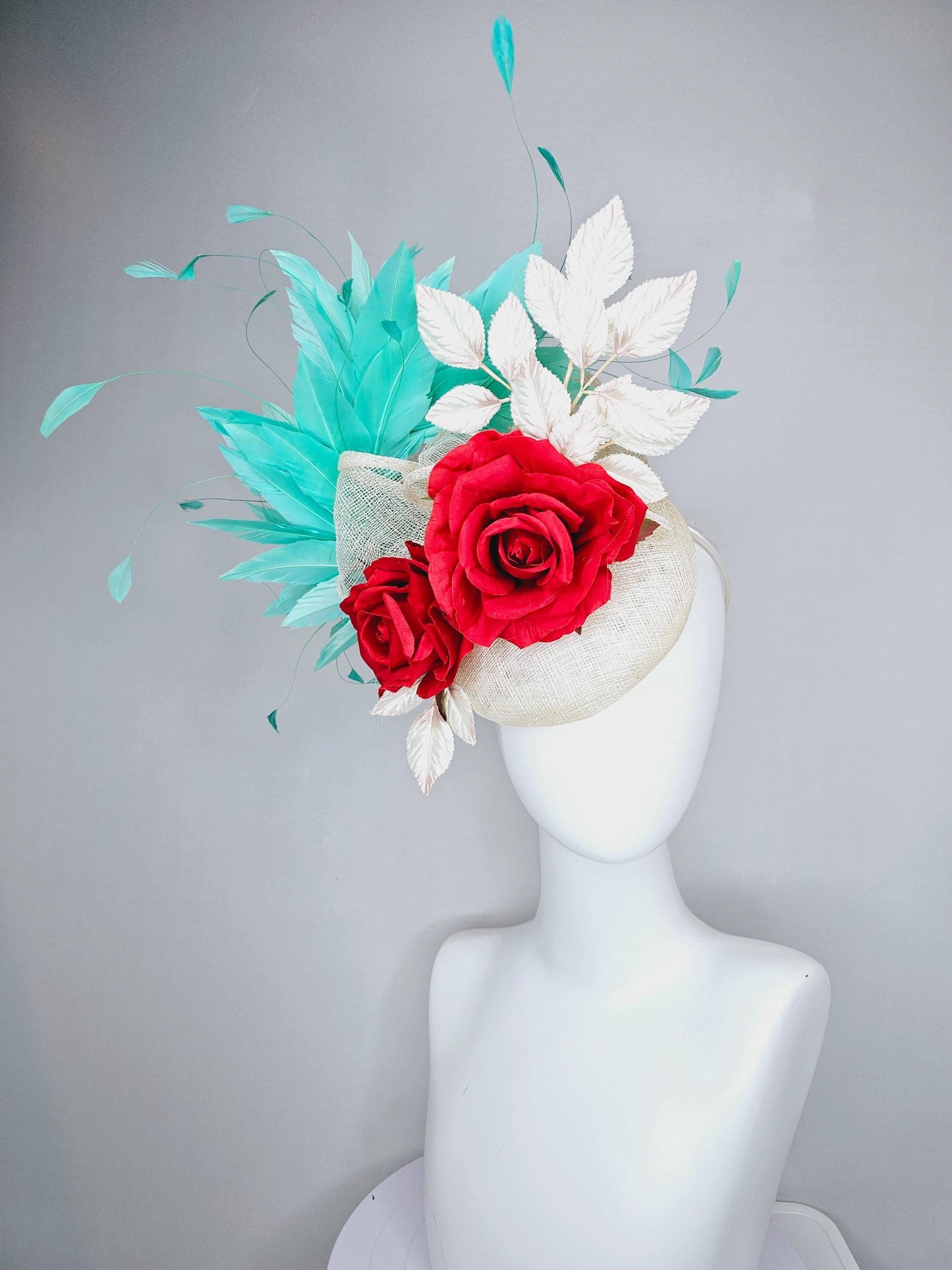 kentucky derby hat fascinator white ivory sinamay with white velvet leaves,aqua green blue branching feathers,bright red satin silk roses