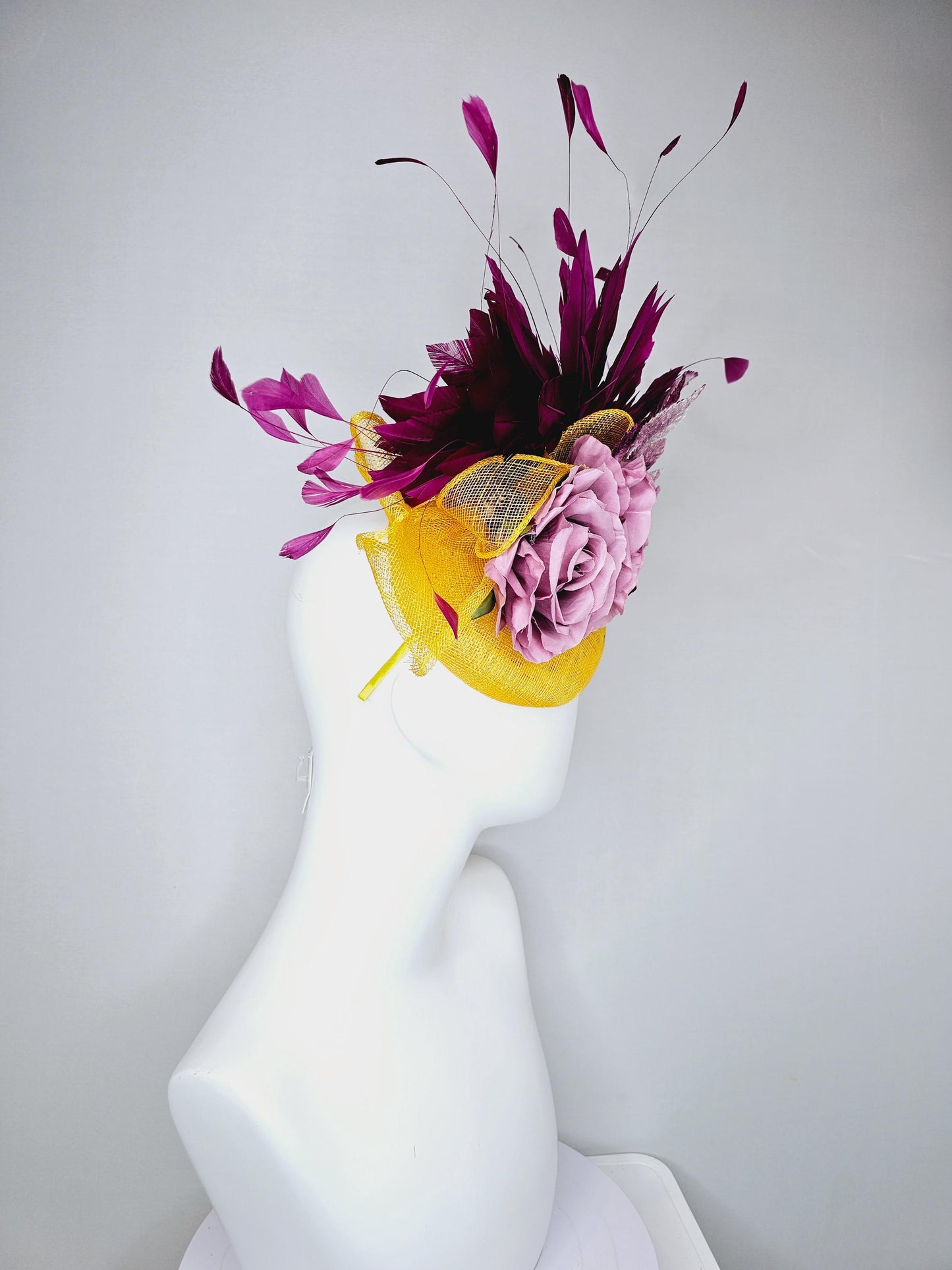 kentucky derby hat fascinator yellow sinamay base w/ yellow sinamay bow,magenta purple feathers,ombre purple leaves,lilac purple satin roses