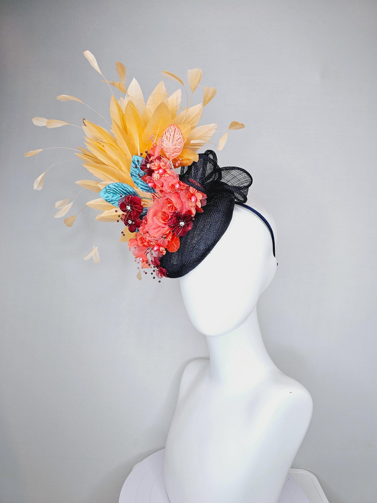 kentucky derby hat fascinator black sinamay, apricot orange yellow feathers, coral orange wine red satin flowers, sky blue coral leaves