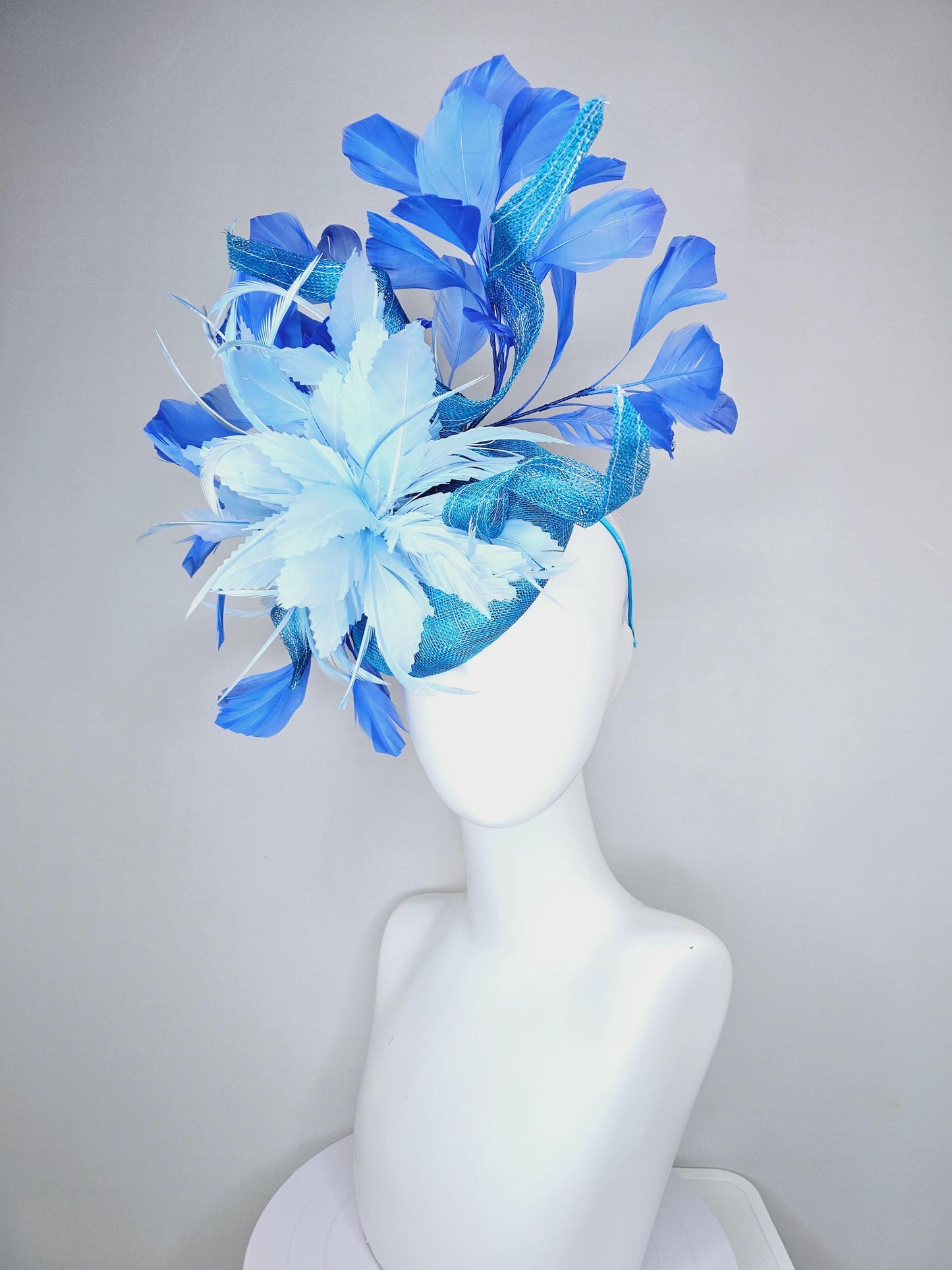 kentucky derby hat fascinator blue sinamay with curls and royal blue branching feathers,light baby blue large feather flower