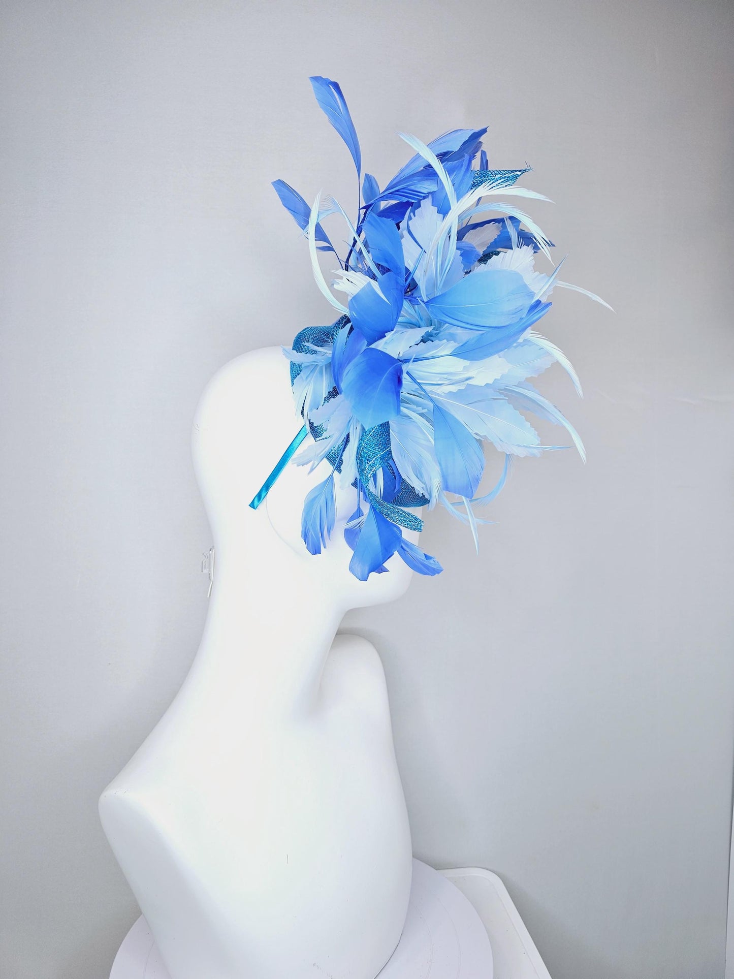 kentucky derby hat fascinator blue sinamay with curls and royal blue branching feathers,light baby blue large feather flower