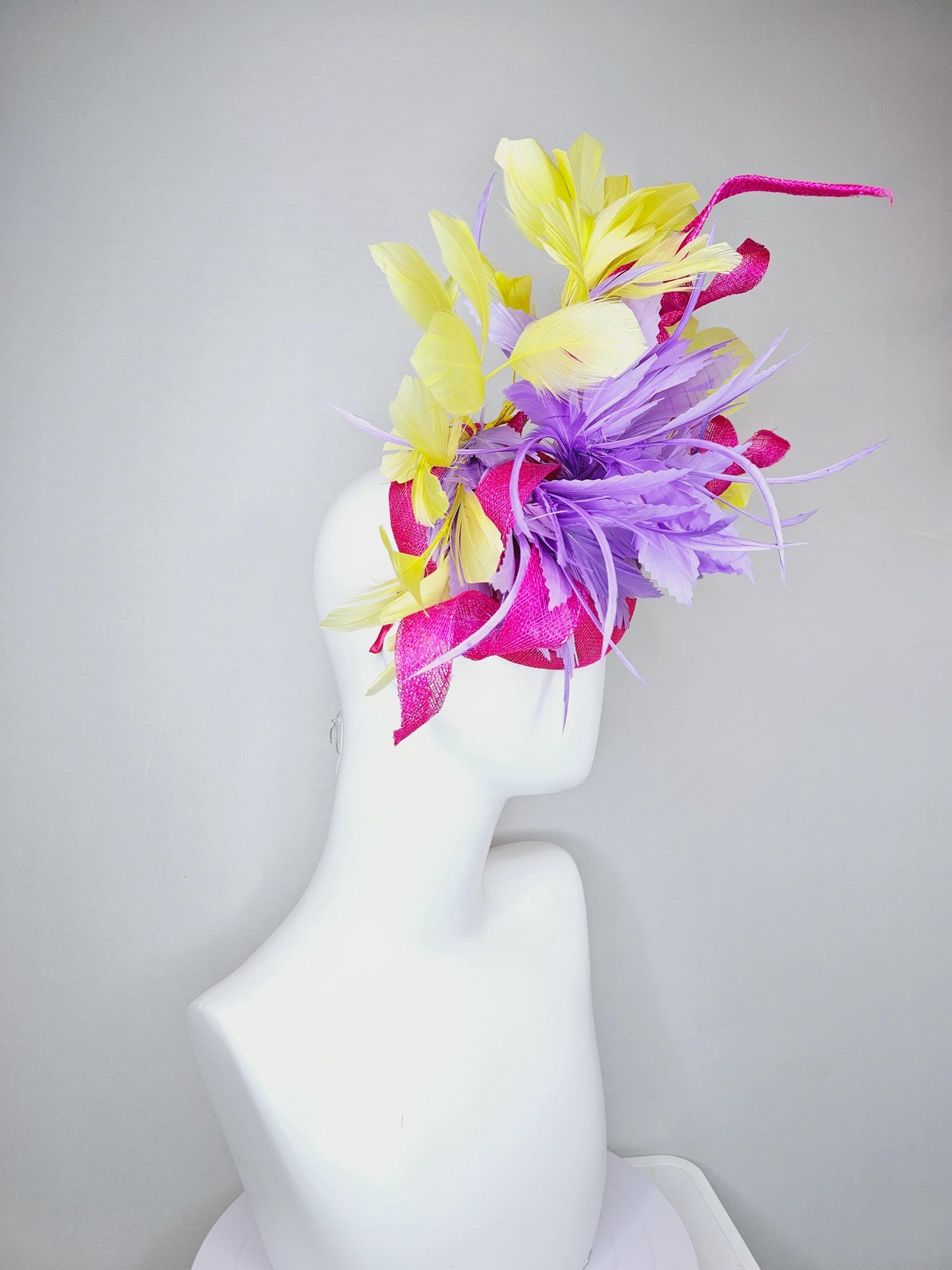 kentucky derby hat fascinator hot pink sinamay with curls and bright yellow branching feathers and purple feather flower