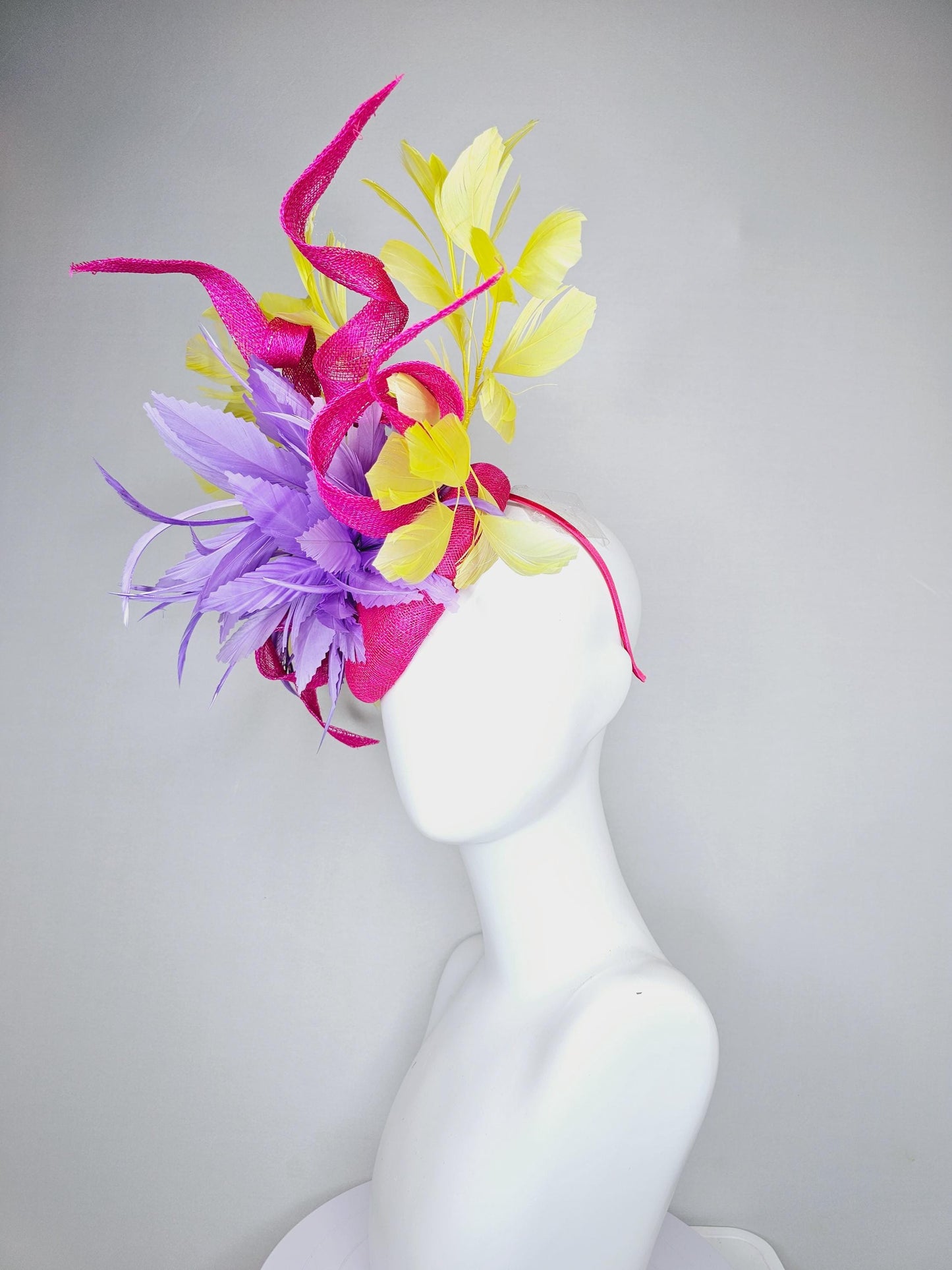 kentucky derby hat fascinator hot pink sinamay with curls and bright yellow branching feathers and purple feather flower