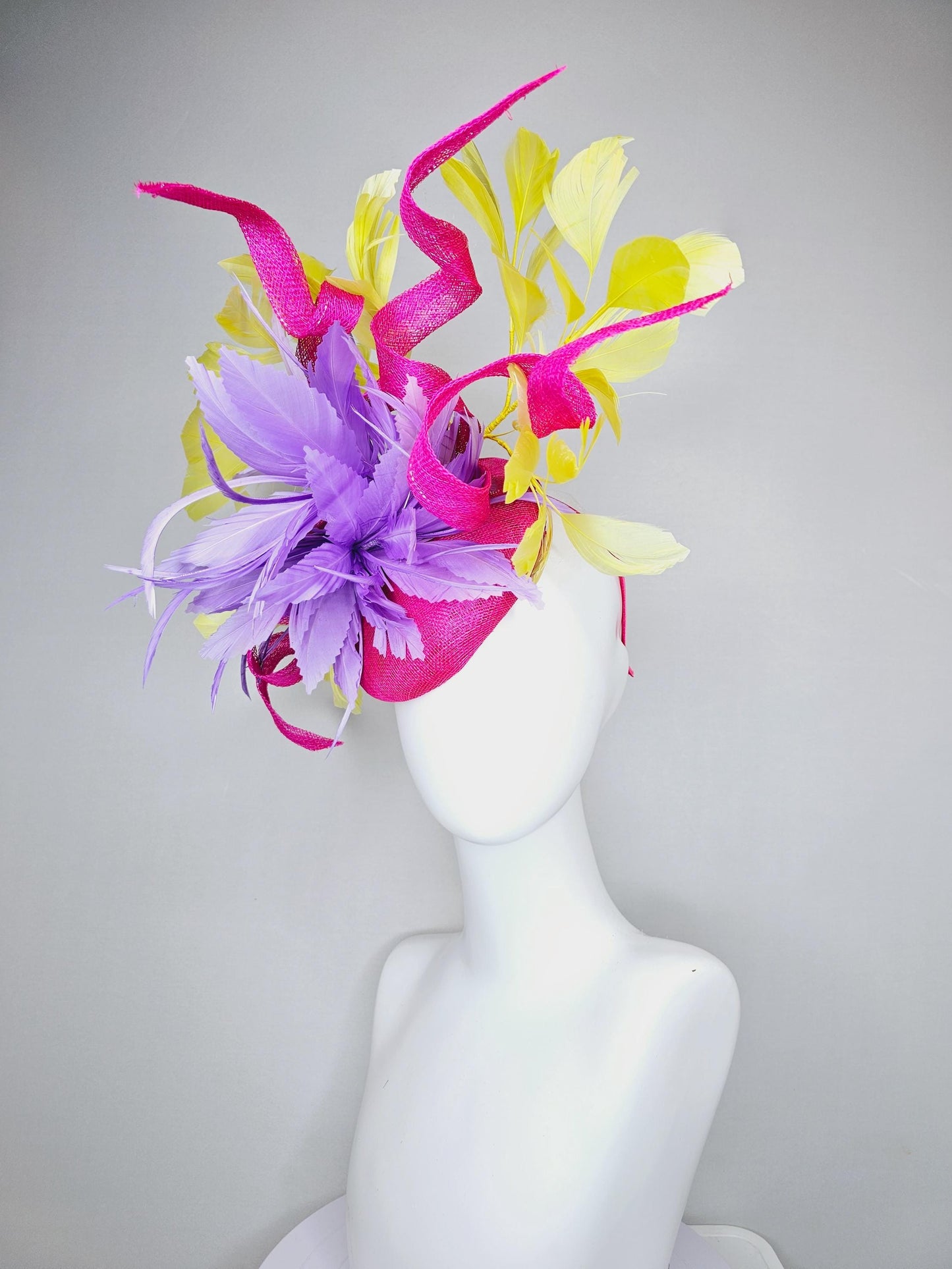 kentucky derby hat fascinator hot pink sinamay with curls and bright yellow branching feathers and purple feather flower