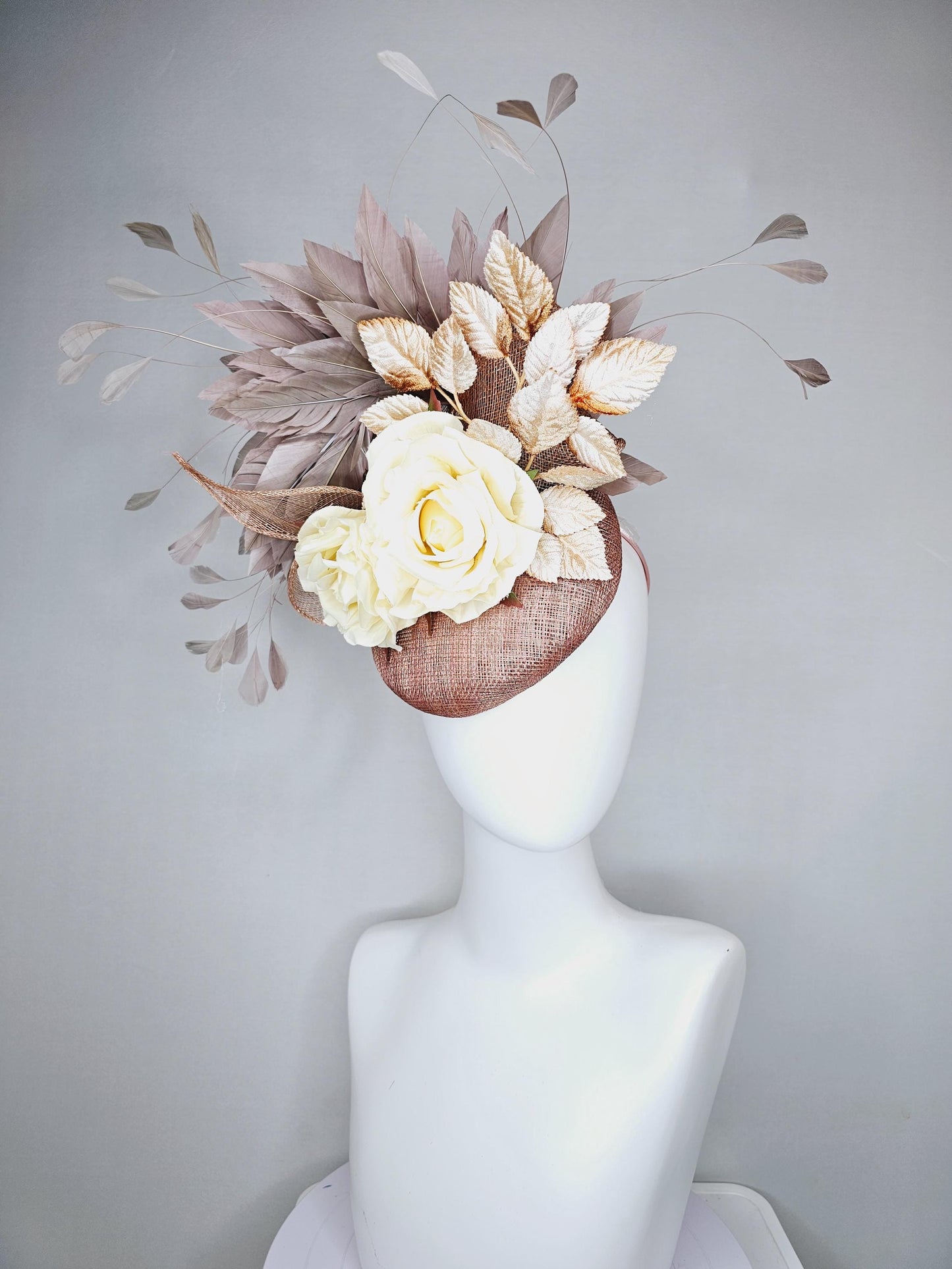 kentucky derby hat fascinator dusty pink sinamay,neutral taupe brown gray branching feathers,gold tan cream leaves,cream satin silk roses