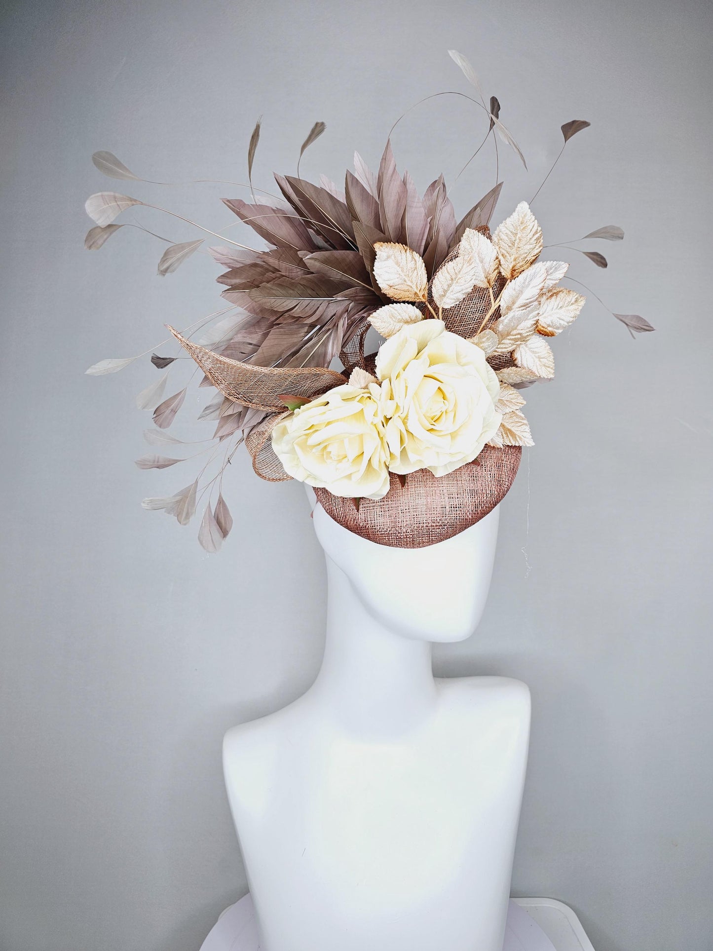 kentucky derby hat fascinator dusty pink sinamay,neutral taupe brown gray branching feathers,gold tan cream leaves,cream satin silk roses