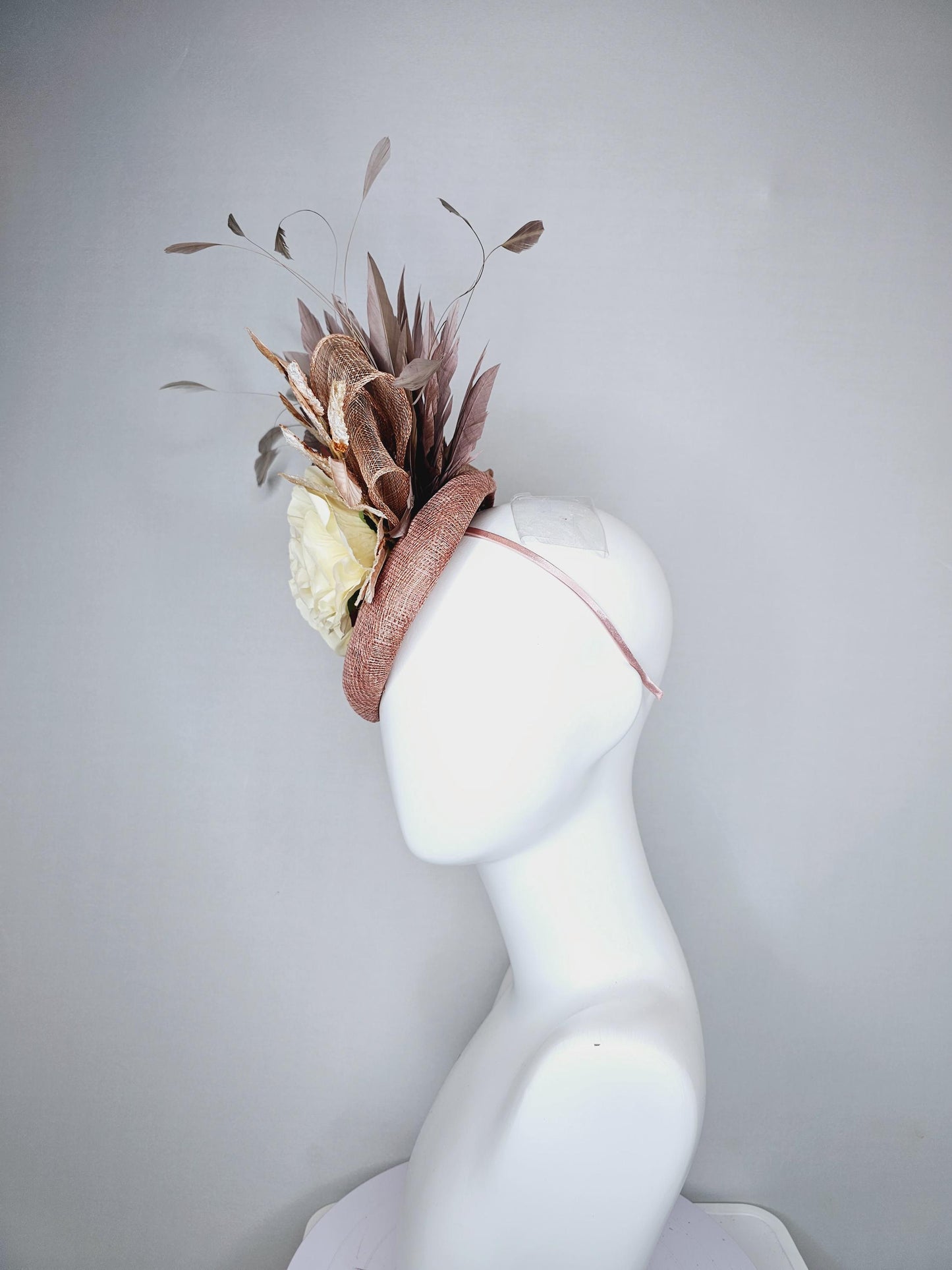 kentucky derby hat fascinator dusty pink sinamay,neutral taupe brown gray branching feathers,gold tan cream leaves,cream satin silk roses