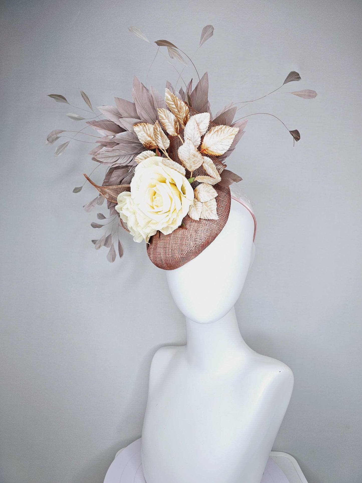 kentucky derby hat fascinator dusty pink sinamay,neutral taupe brown gray branching feathers,gold tan cream leaves,cream satin silk roses