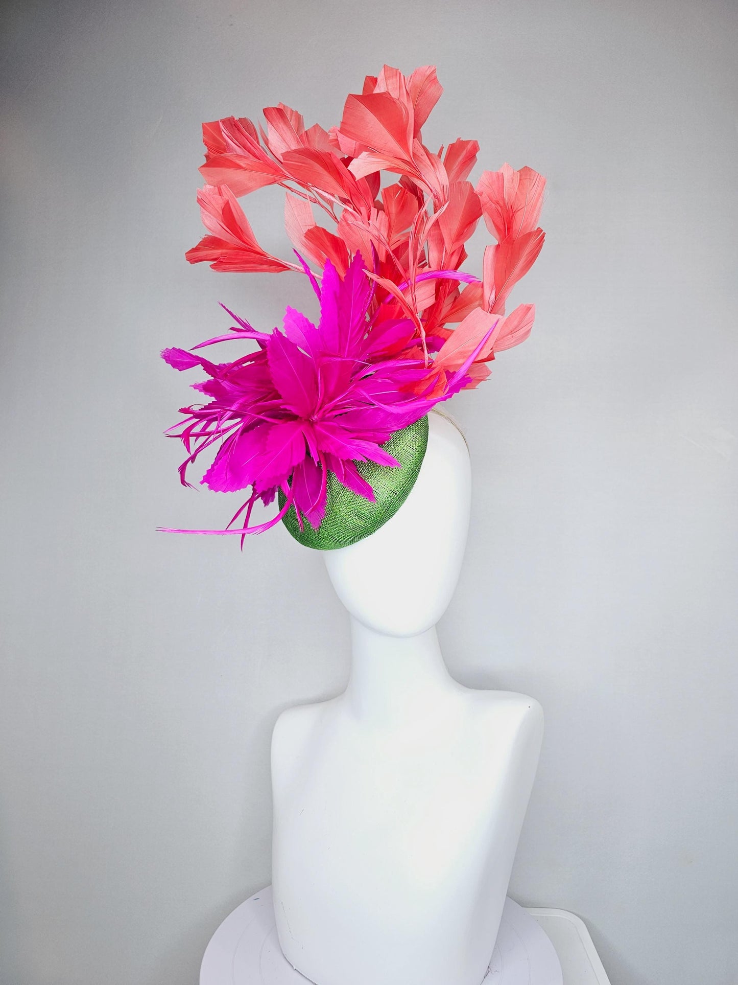 kentucky derby hat fascinator lime green sinamay base with bright pink fuchsia zigzag feather flowers, coral orange branching feathers