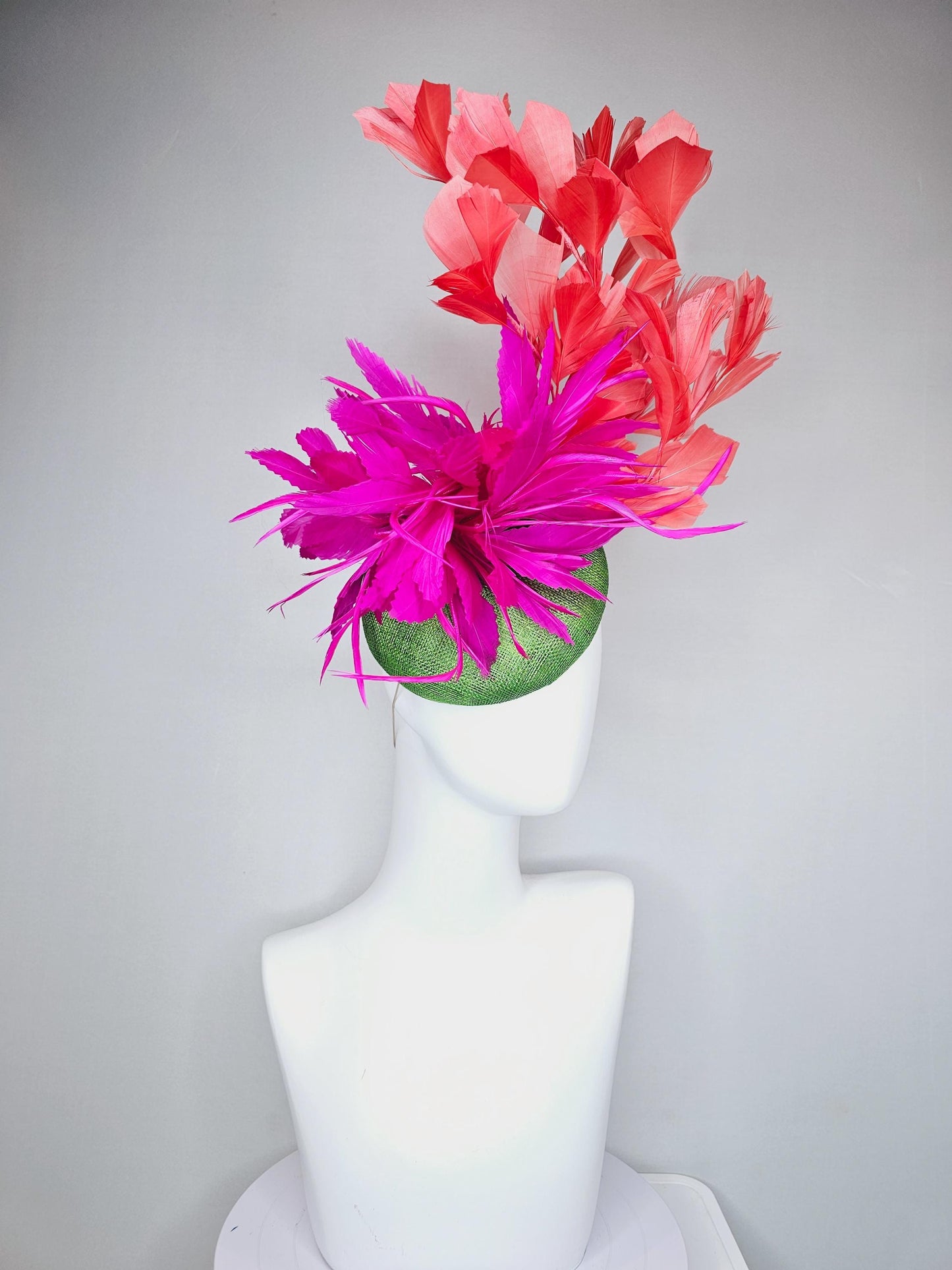 kentucky derby hat fascinator lime green sinamay base with bright pink fuchsia zigzag feather flowers, coral orange branching feathers